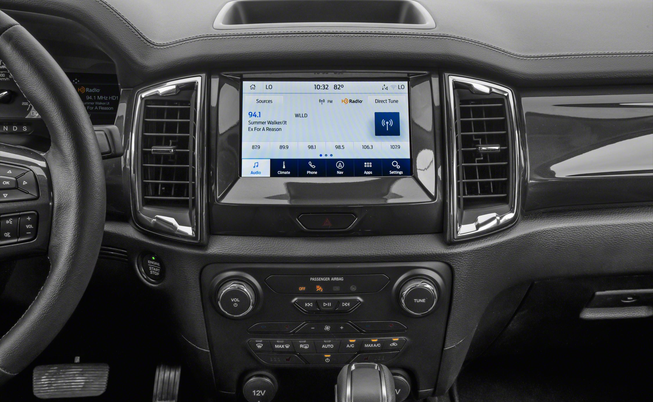 Touchscreen infotainment system with climate control panel and push start button