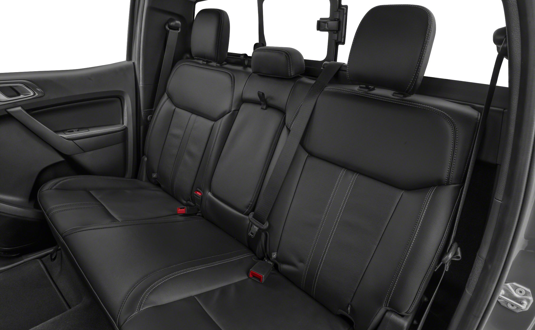 Black leather rear seats with modern stitching and integrated headrests