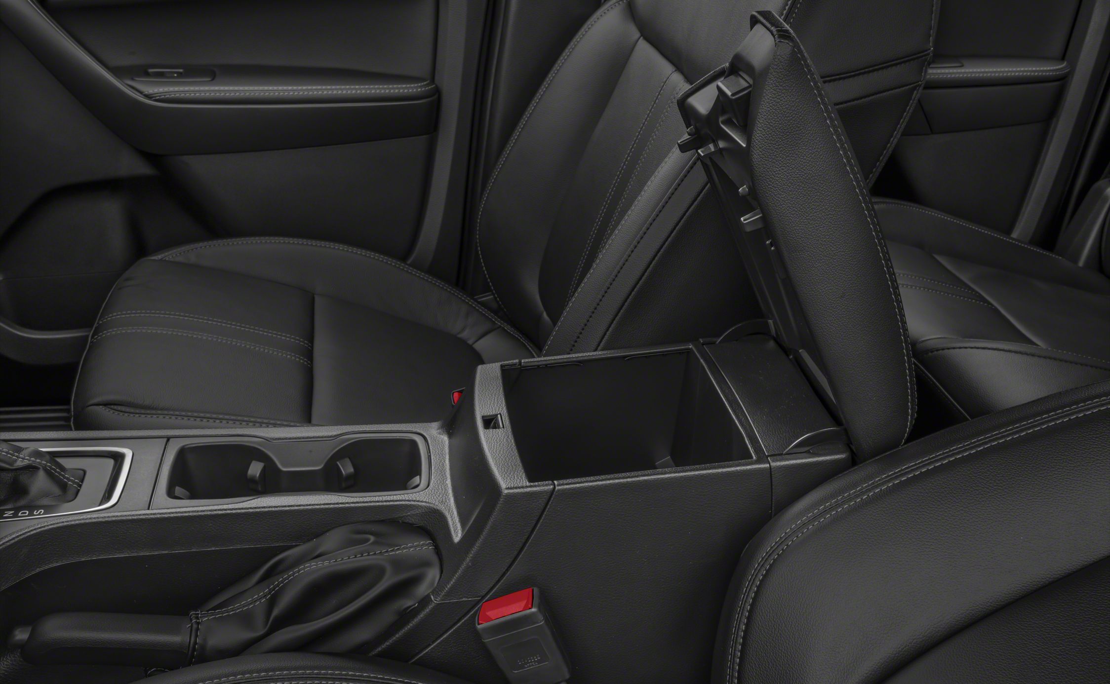 Black leather seats with open center console storage and dual cup holders