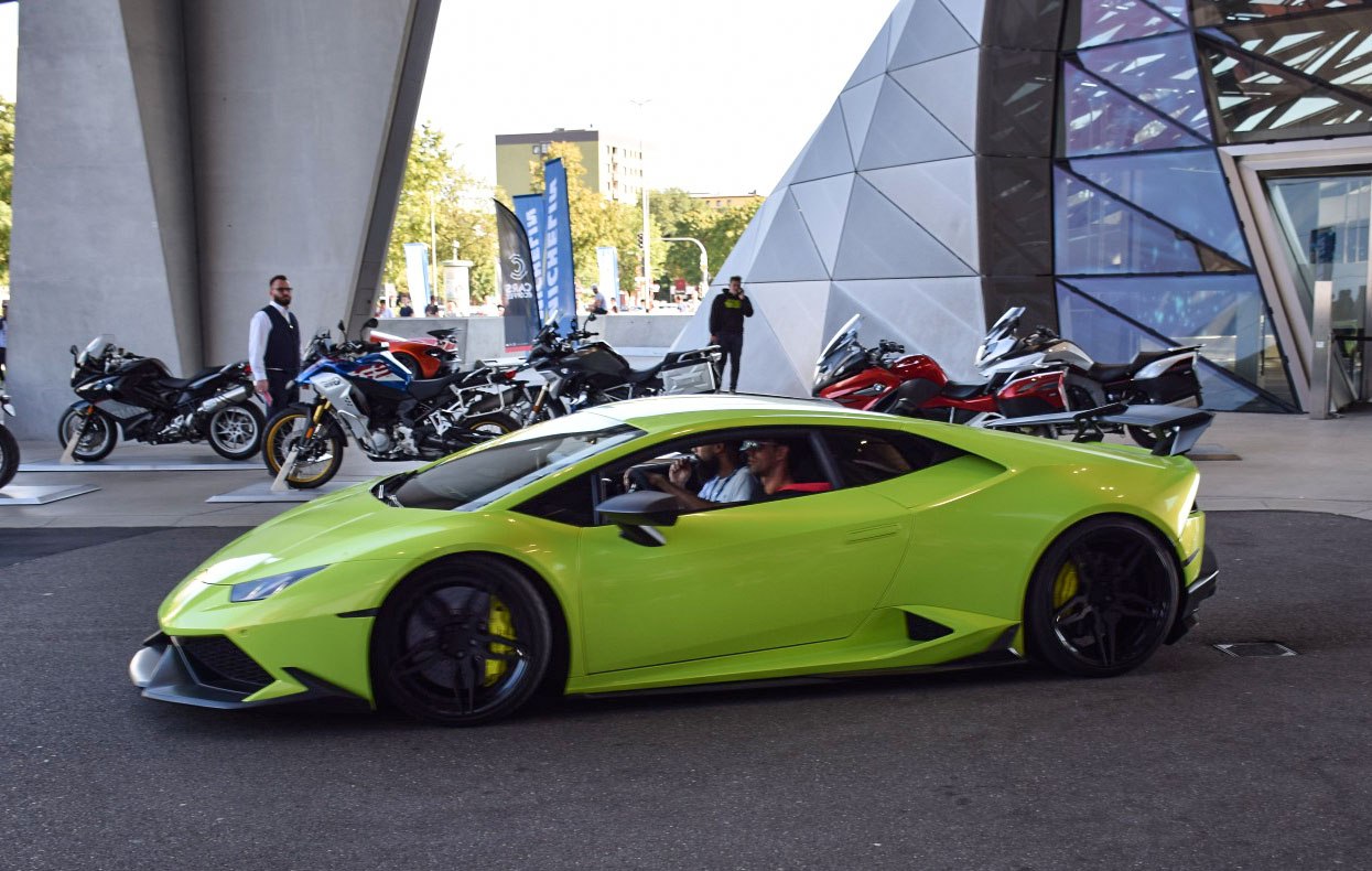 Sleek side profile with aerodynamic design and black wheels