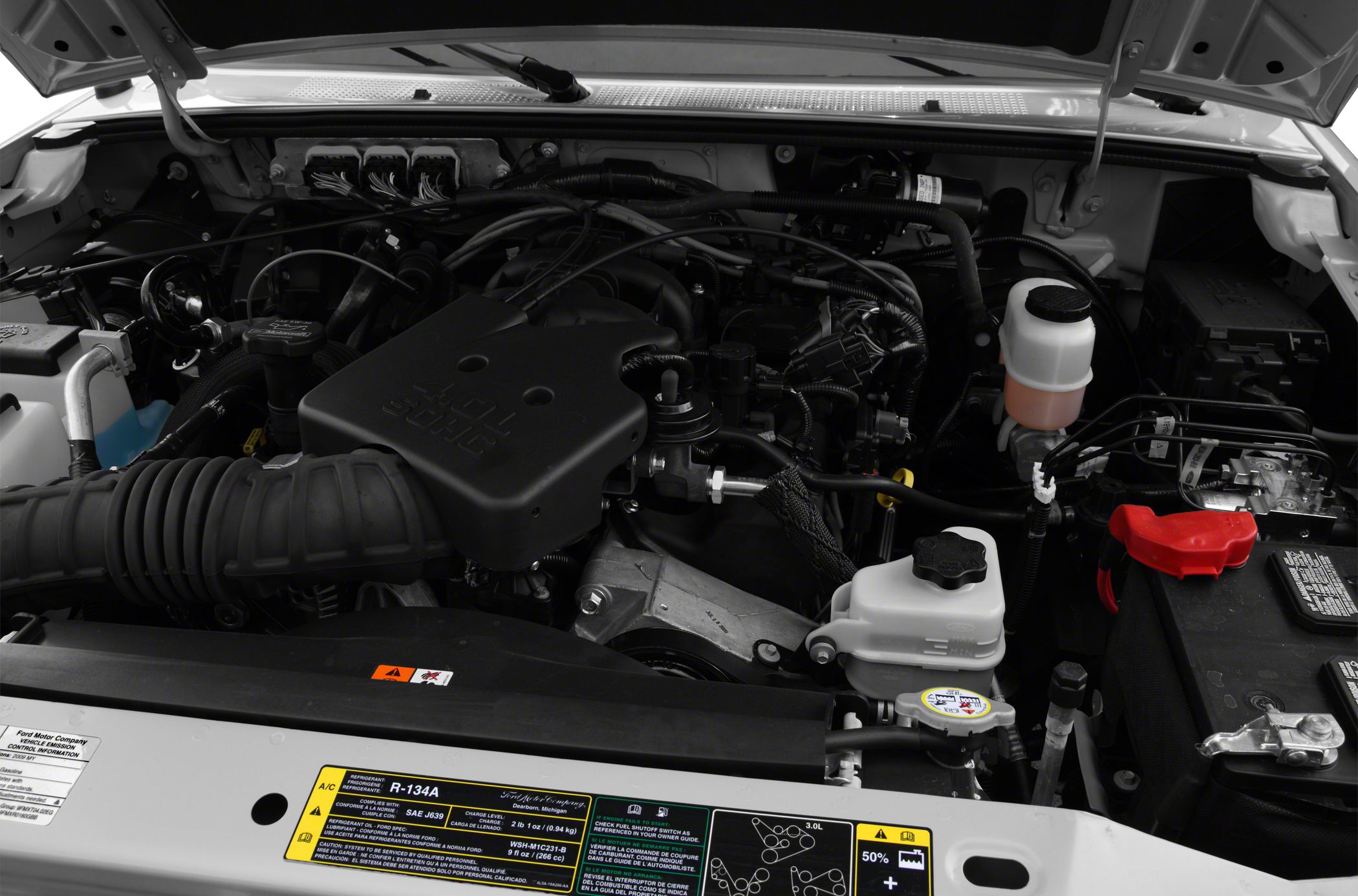 Engine compartment with 3.0L engine and visible components