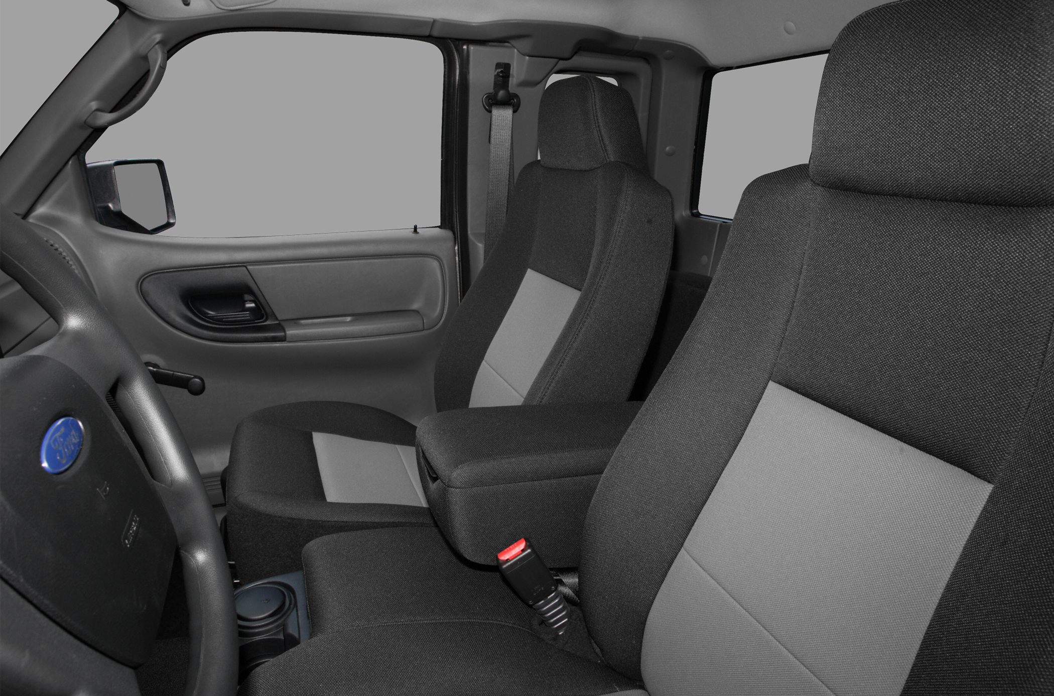 Front seats with armrest and seatbelt in vehicle interior