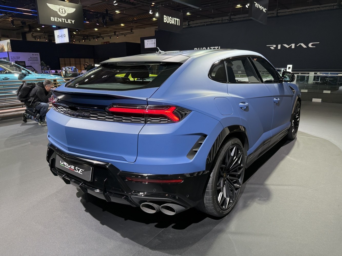 Rear view of SUV with sleek taillights and quad exhausts