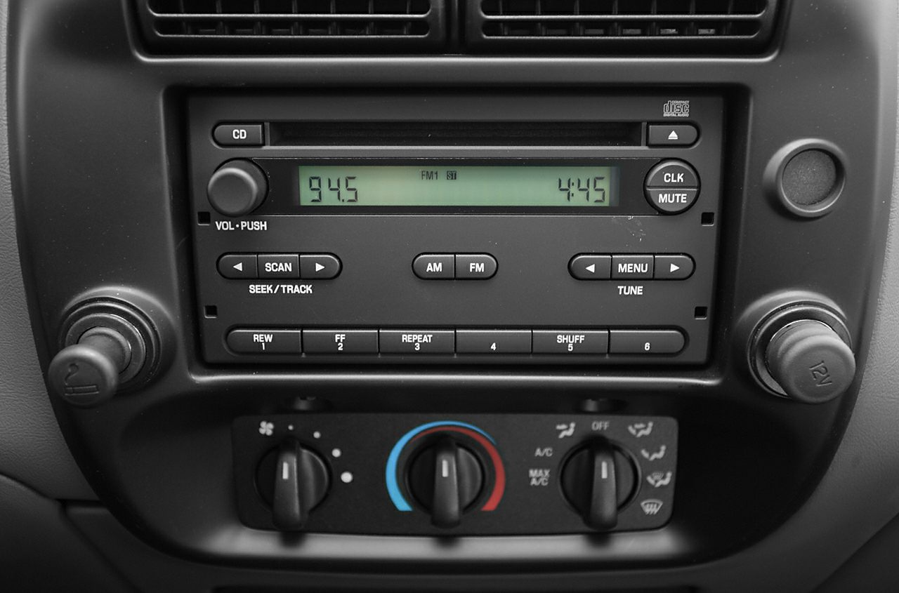 Car audio system with CD player and manual HVAC controls