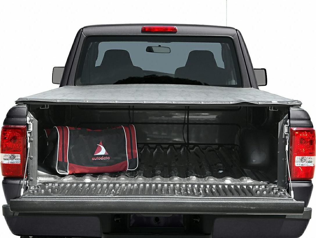 Open cargo bed with soft tonneau cover and protective bedliner