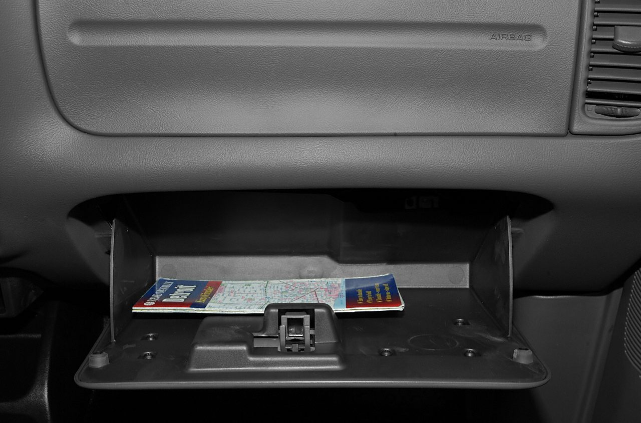 Glovebox compartment interior with a map inside