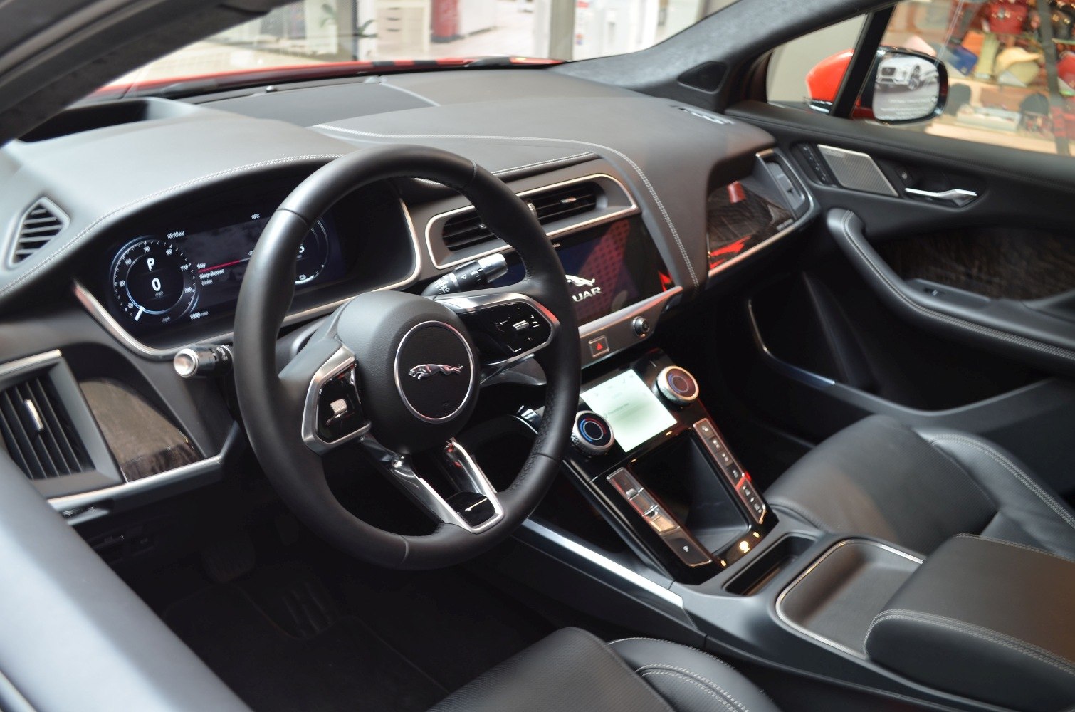 Dashboard and steering wheel with digital displays and controls