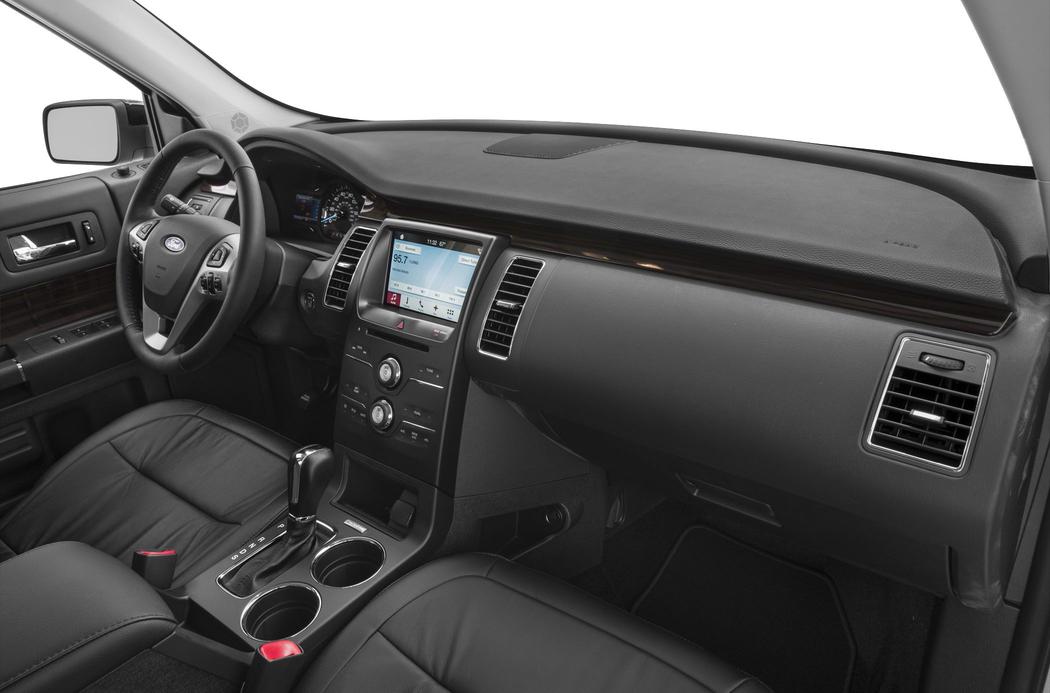 Interior of a SUV with dashboard, infotainment screen, steering wheel, and leather seats.