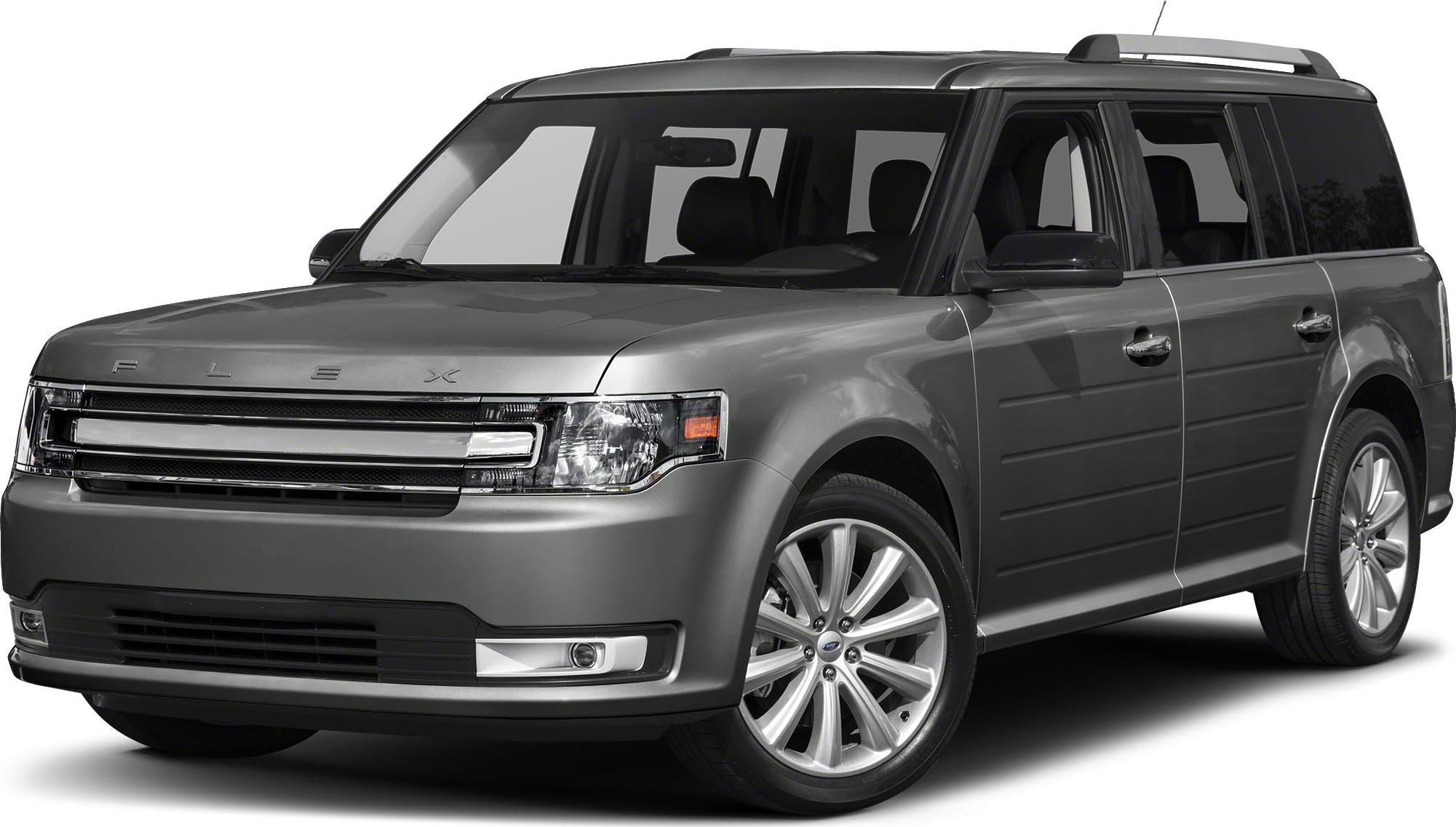 Front side view of a wide SUV with distinct grille and alloy wheels