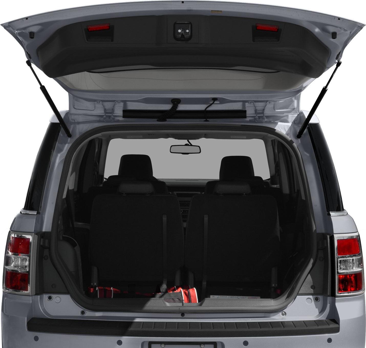 Open rear hatch showing third-row seats and cargo space
