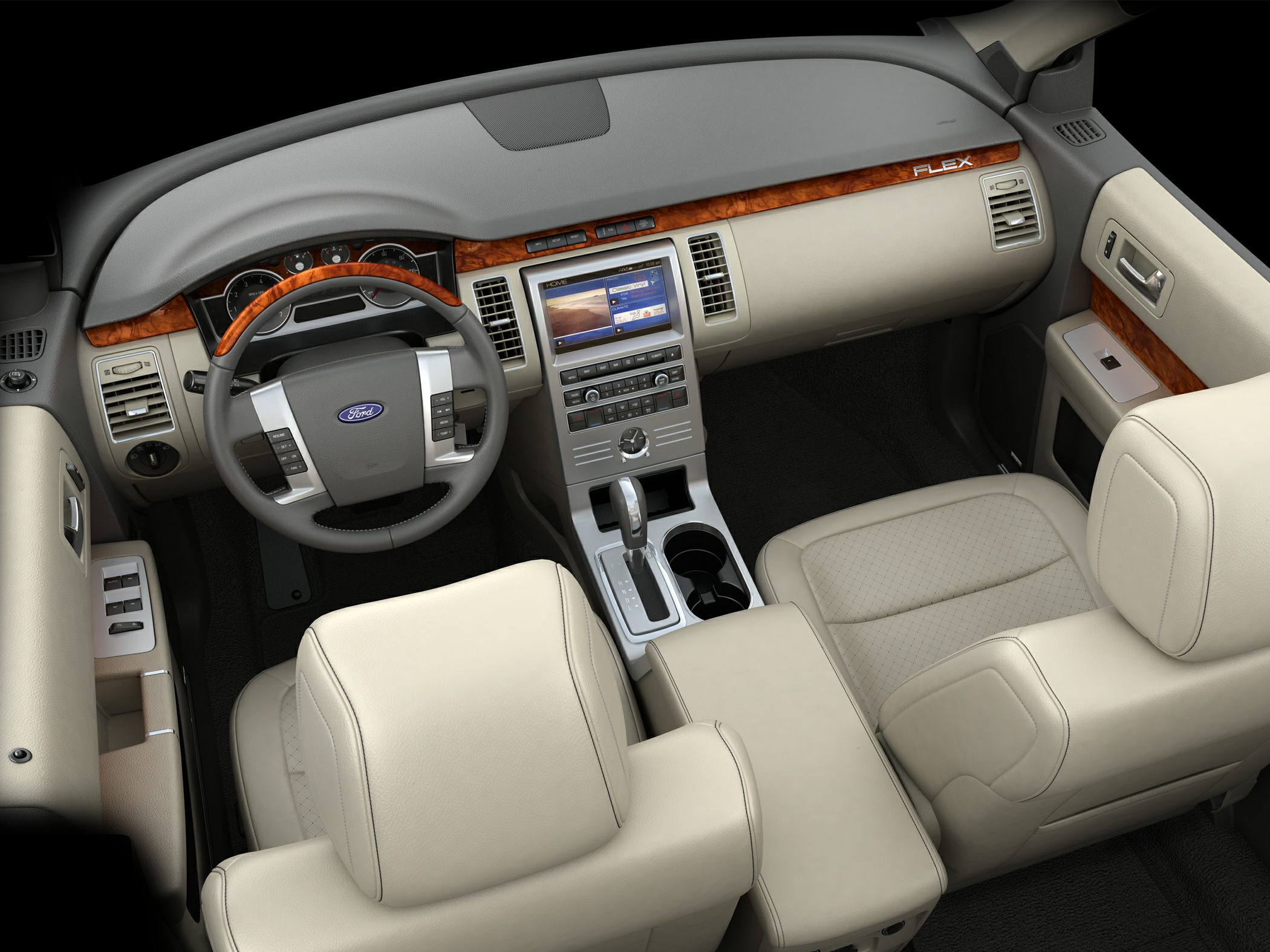 Interior dashboard with wood trim, touchscreen, leather seats, and steering wheel controls