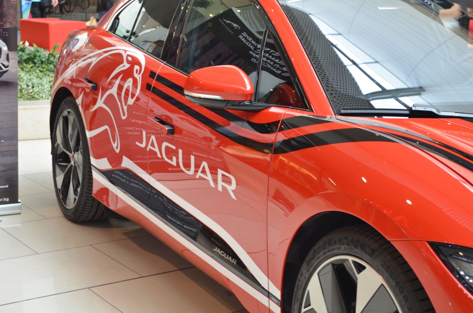 Side view with decal artwork and alloy wheels