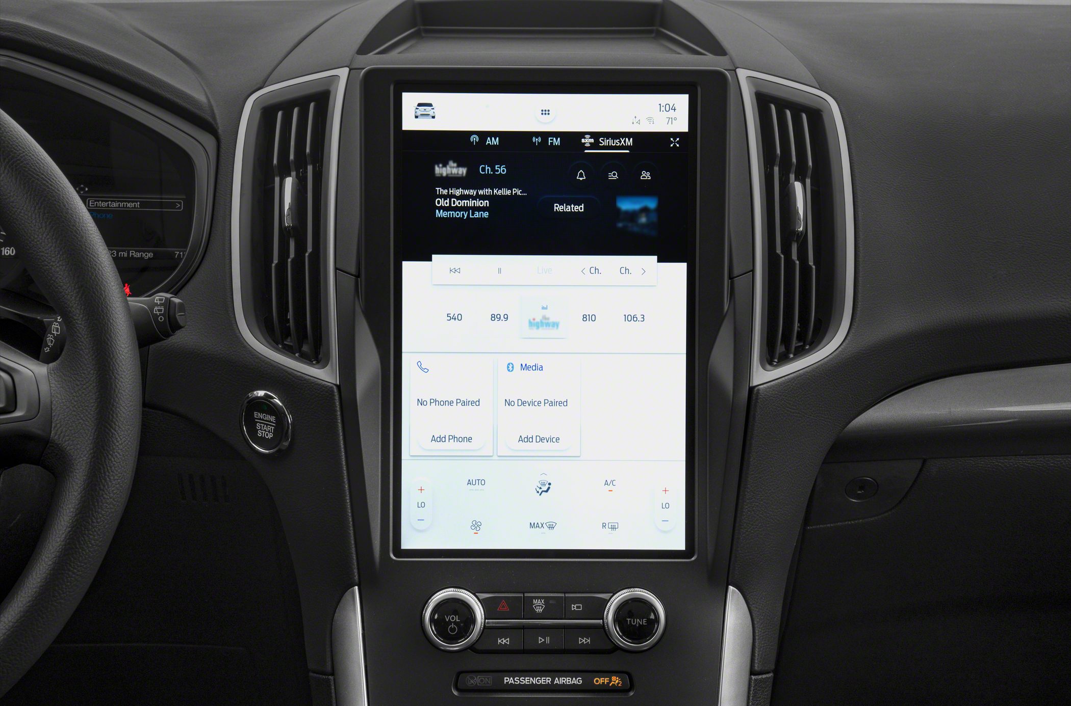 Large vertical touchscreen with media and climate controls