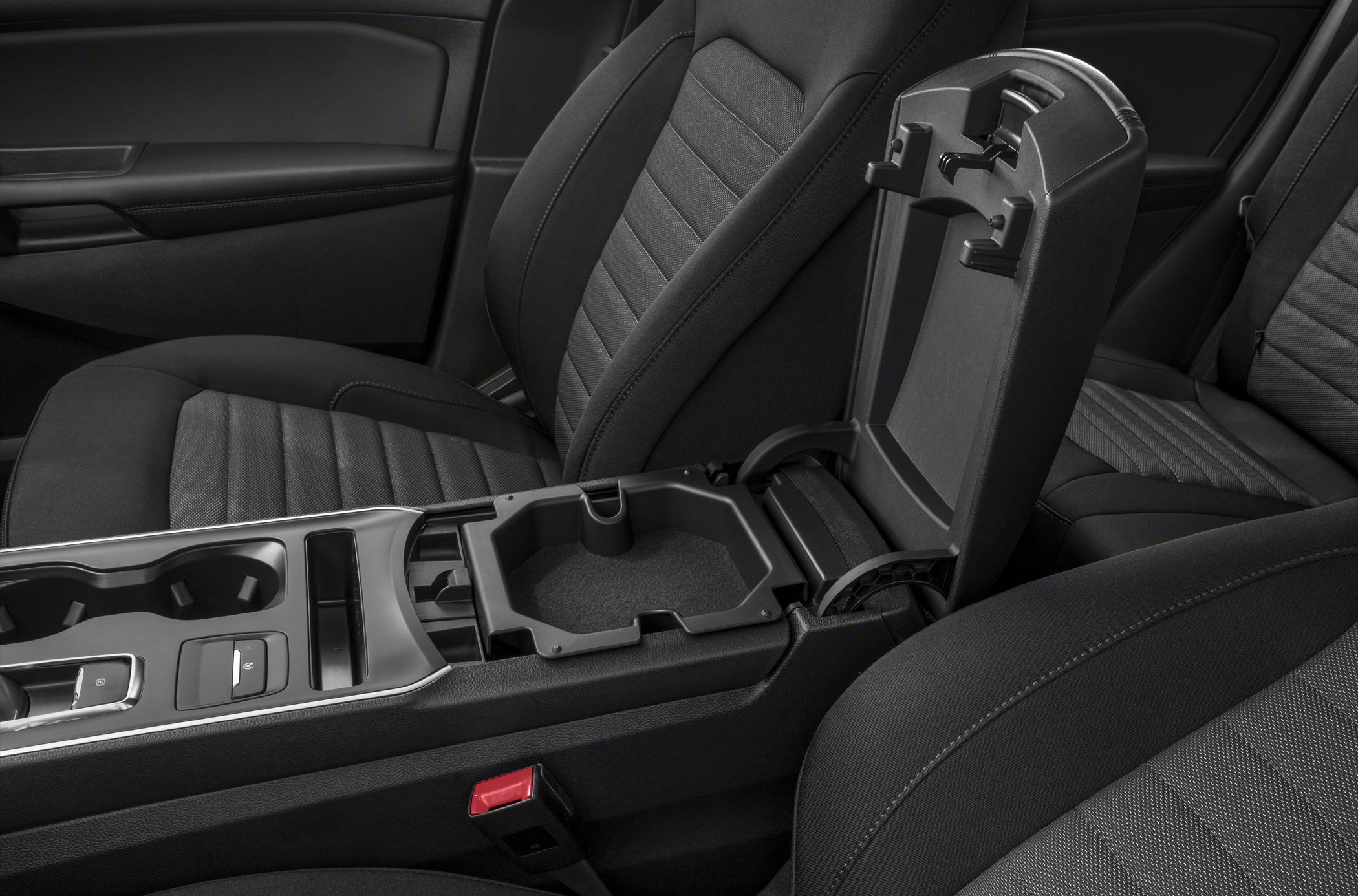 Rear center console storage with cup holders and padded armrest