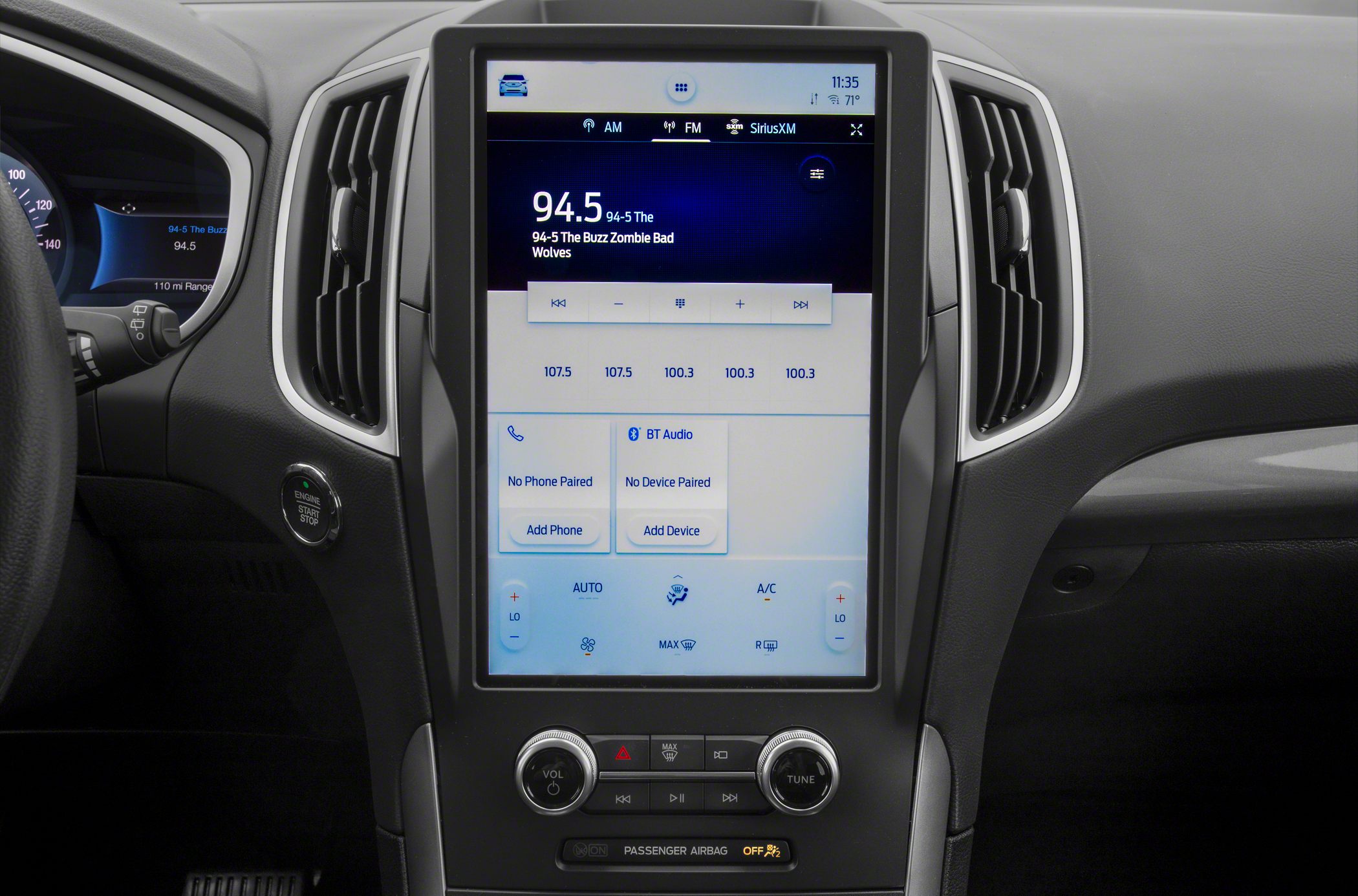 Large central touchscreen infotainment with climate and audio controls