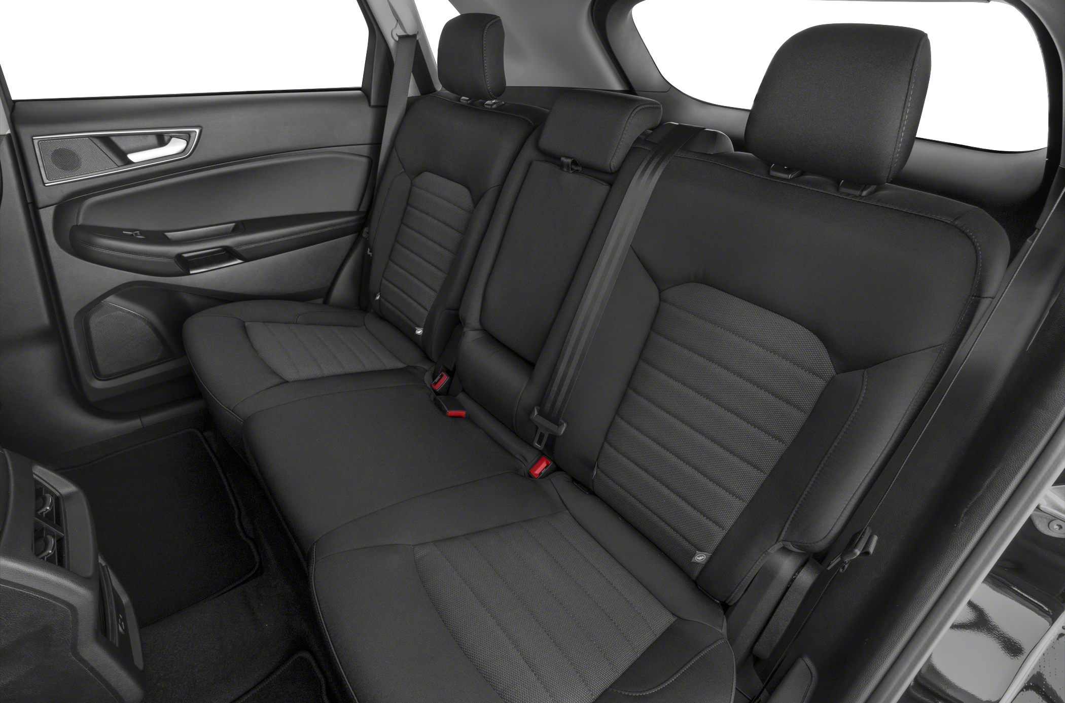 Spacious rear seat with black upholstery and integrated seat belts
