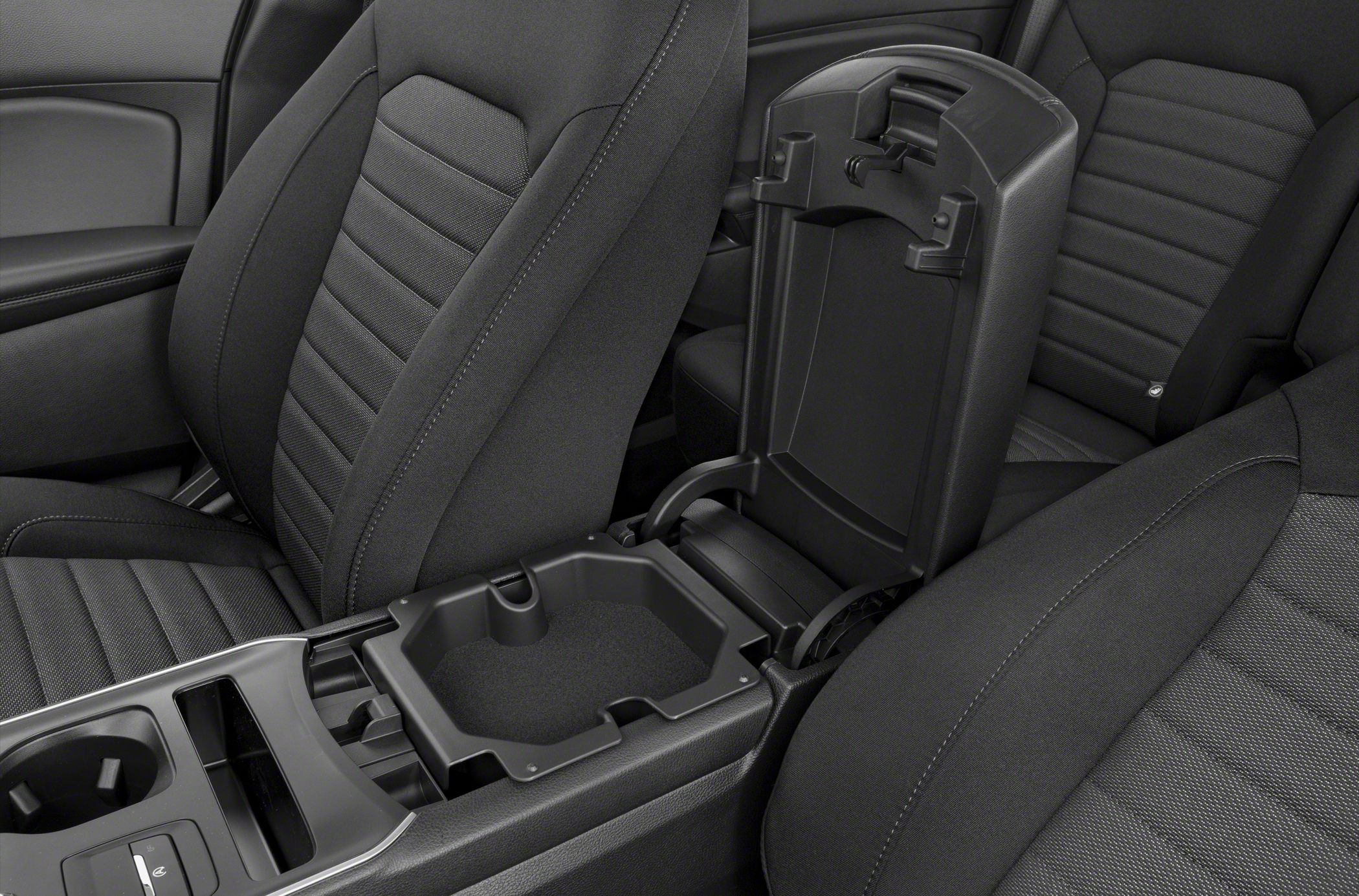Open center console and front fabric seats in vehicle interior