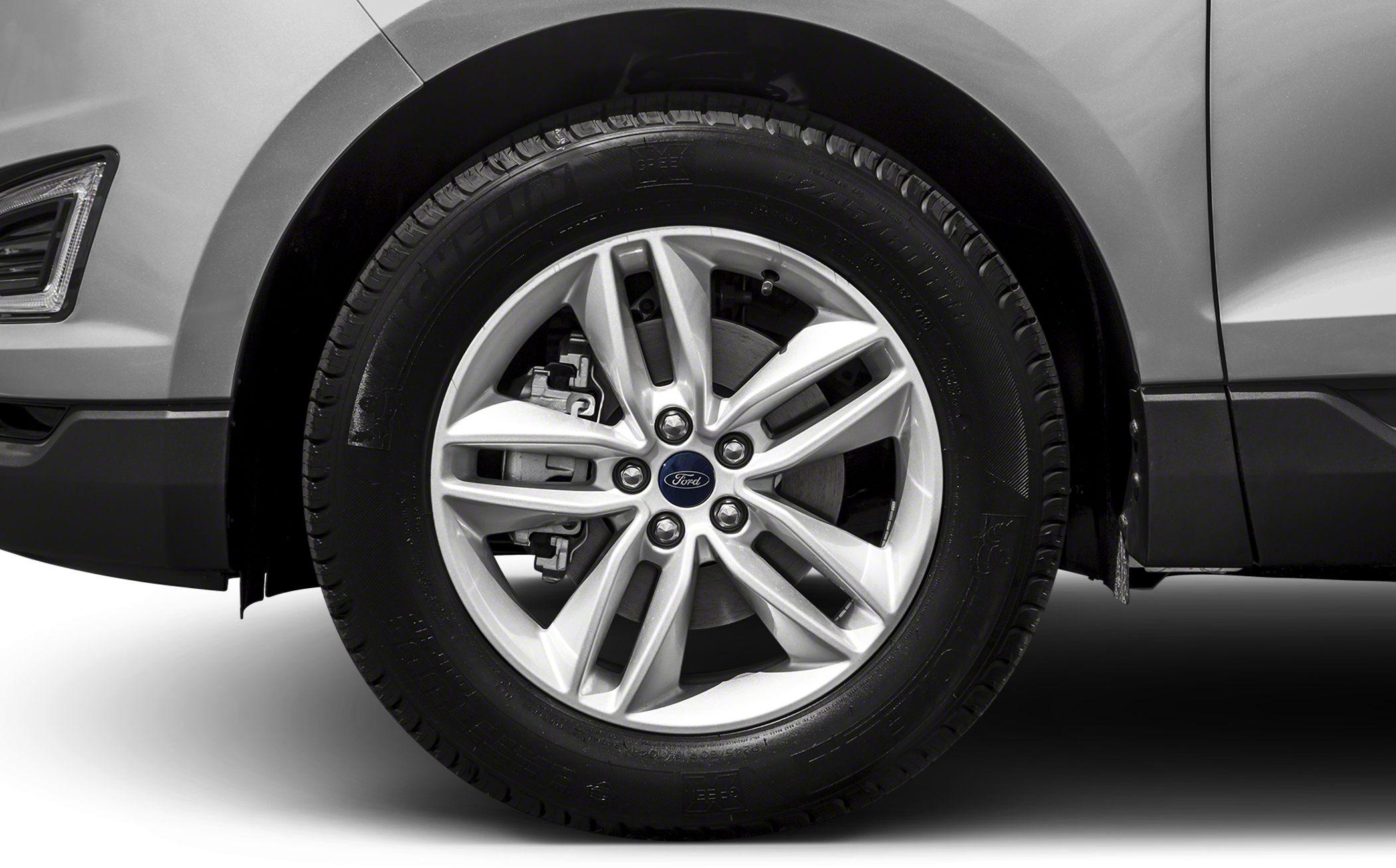 Close-up of alloy wheel with multi-spoke design and visible brake caliper