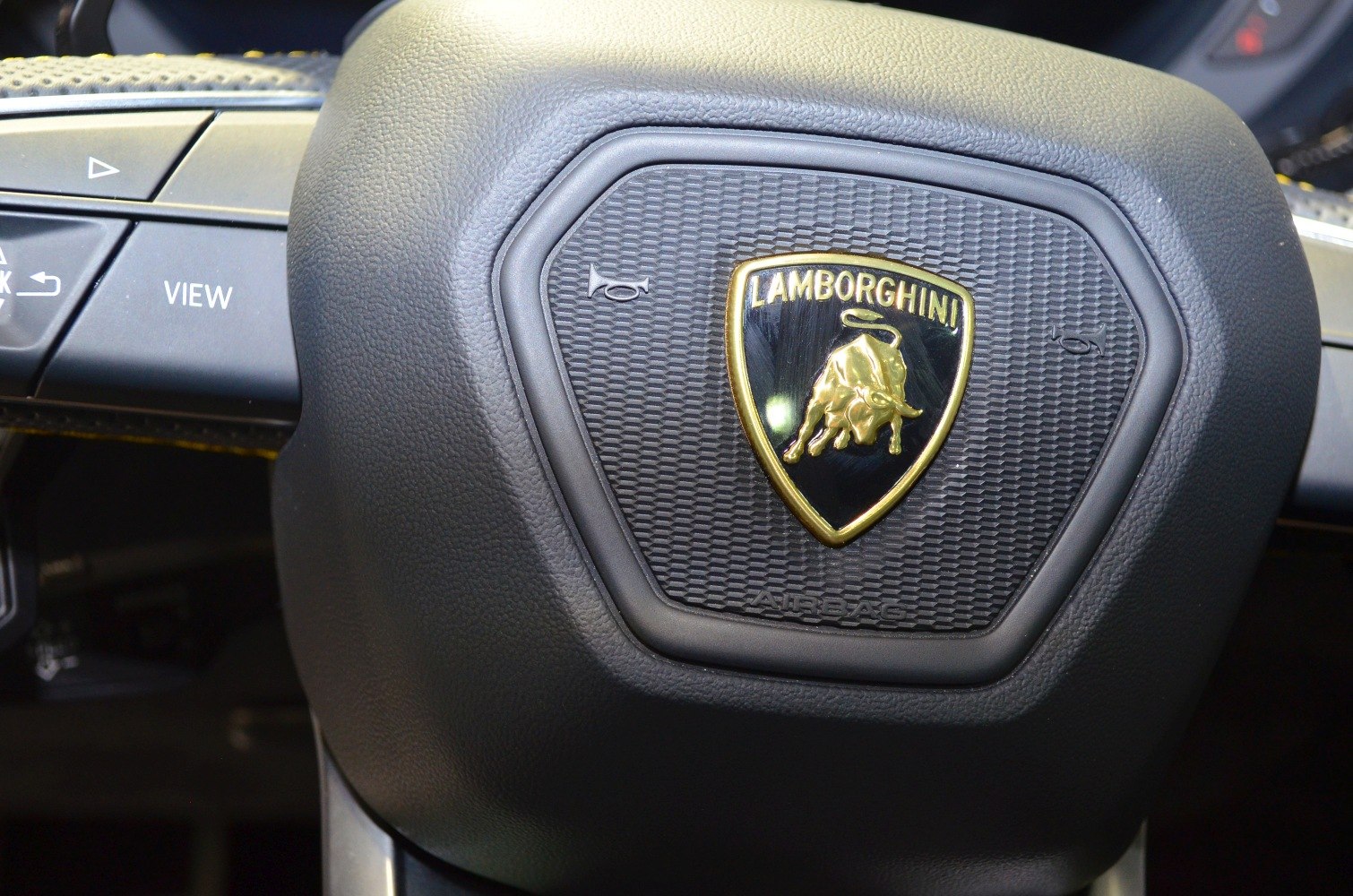 Lamborghini Urus steering wheel with emblem and control buttons