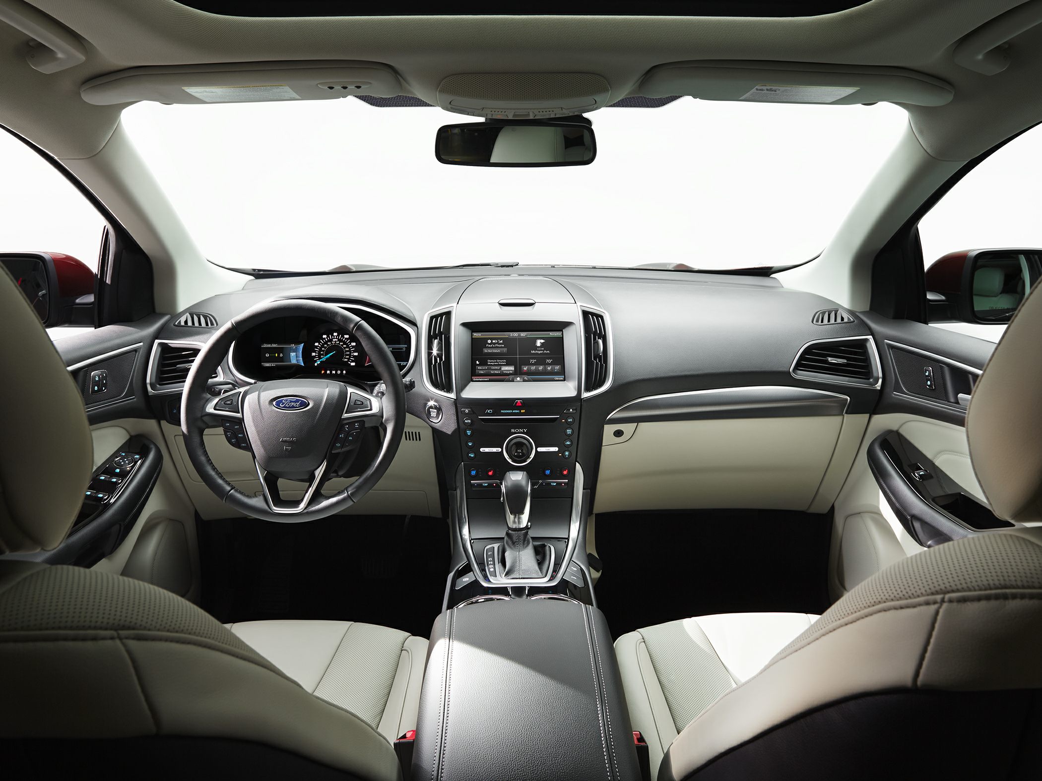 Dashboard, steering wheel, and center console in a vehicle interior