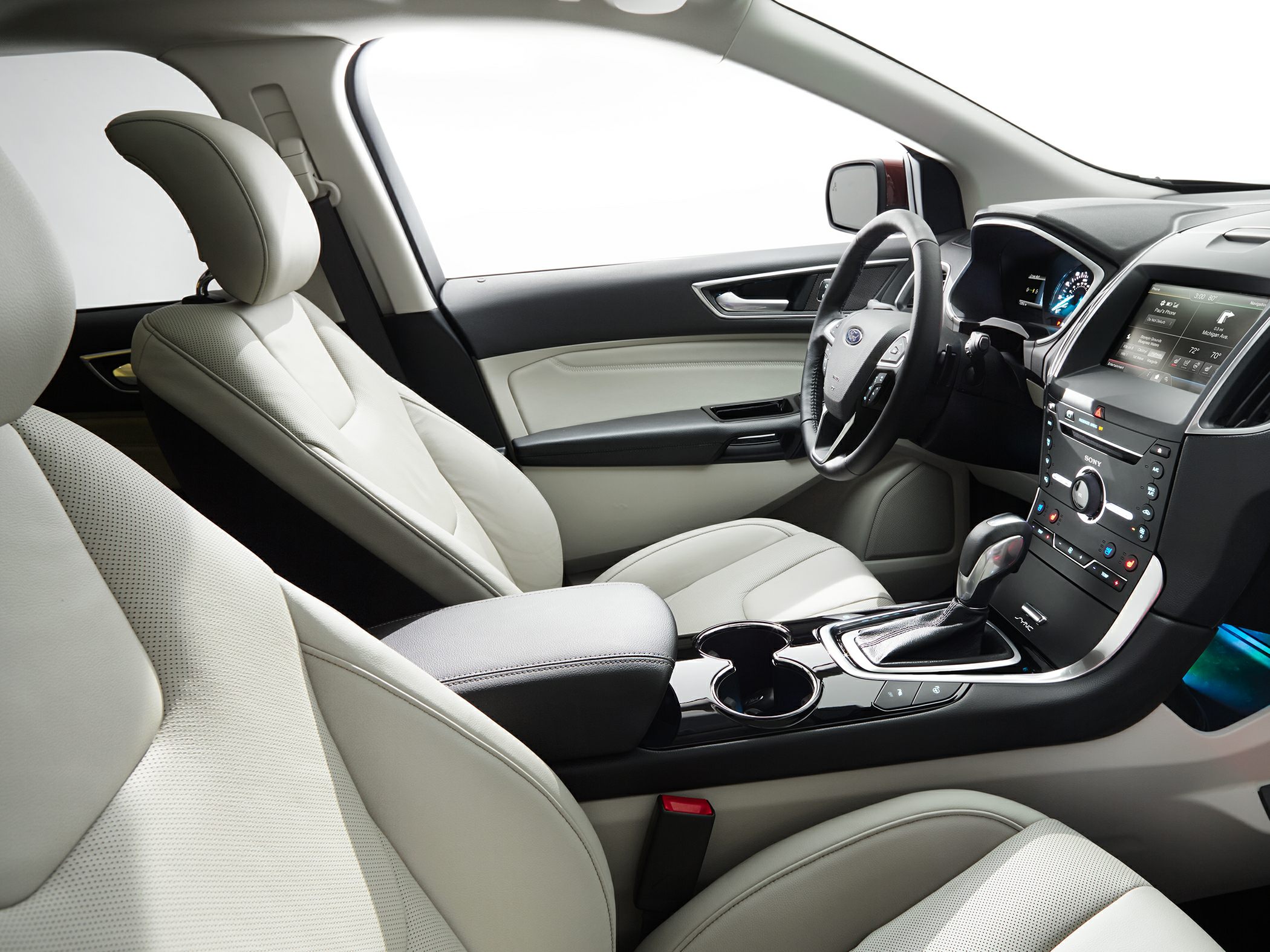 Leather seats and advanced driving console with gear shift and infotainment system
