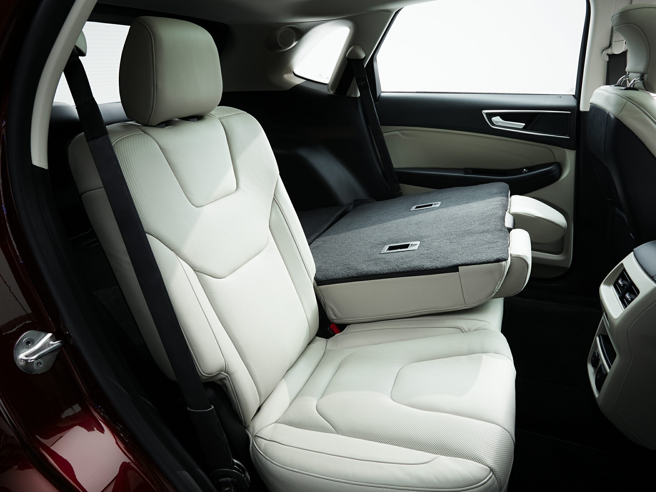Rear seat folding with leather upholstery and seatbelt