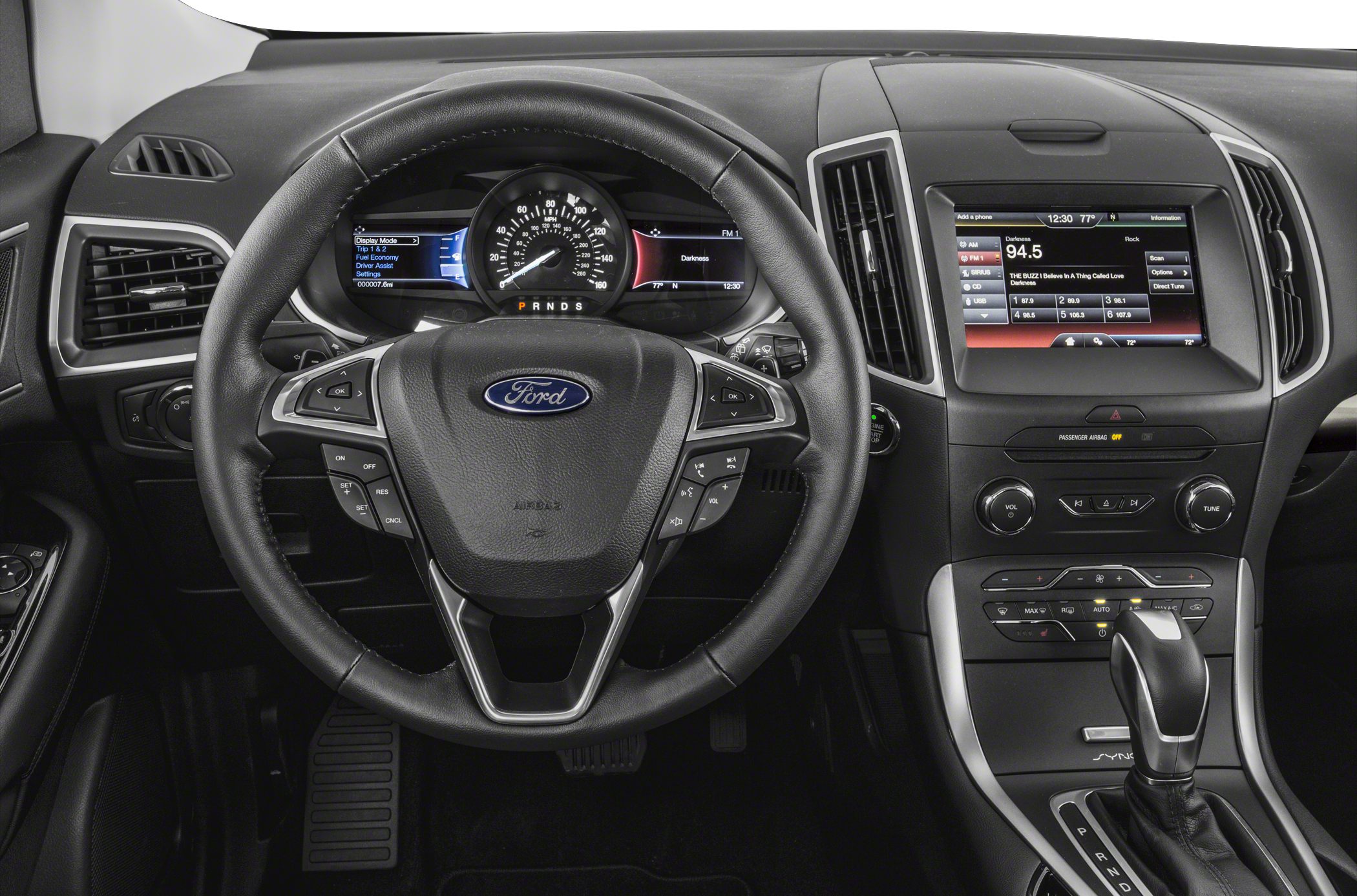 Steering wheel with integrated controls and center dashboard infotainment system