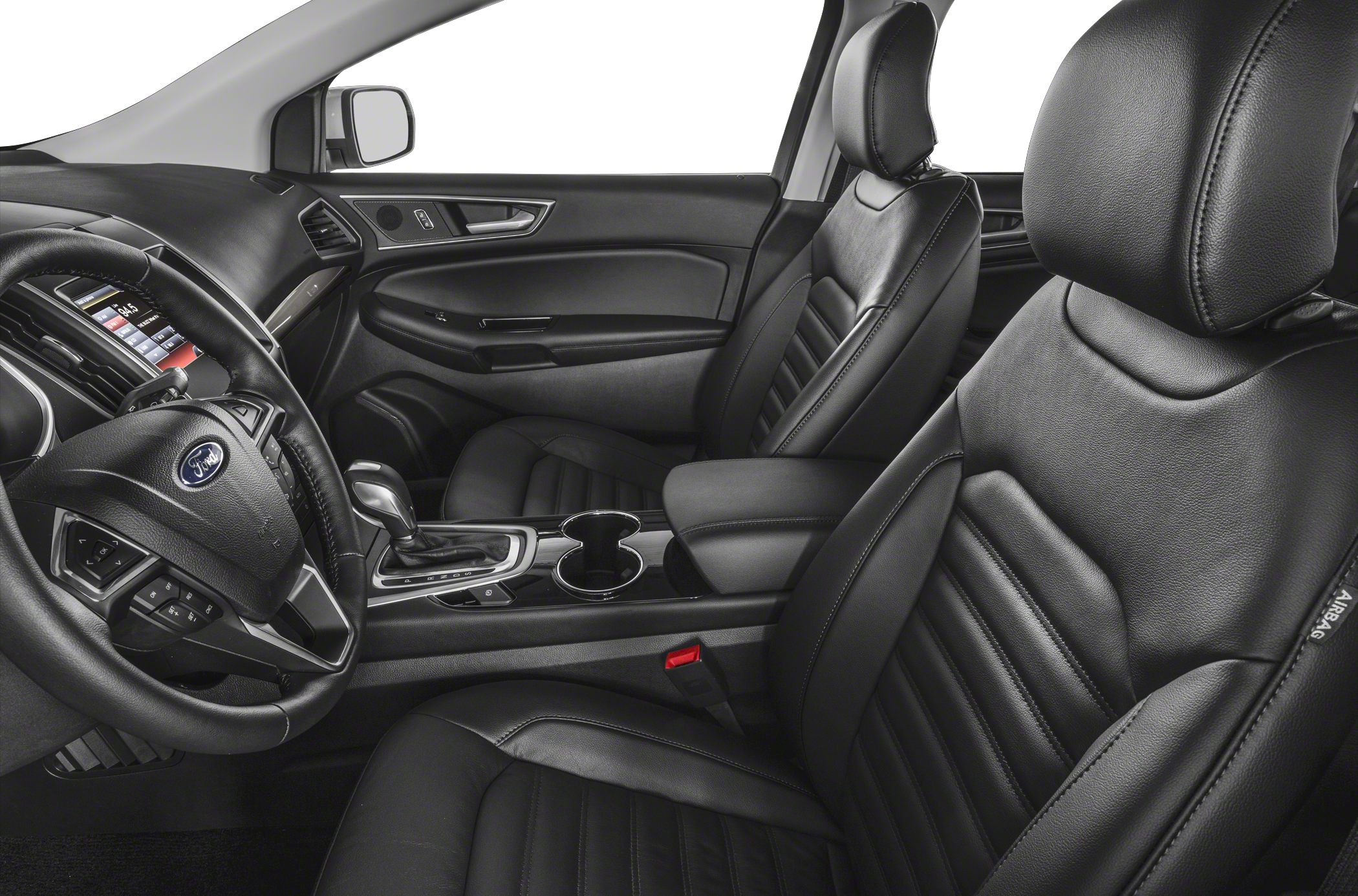 Leather seats with detailed stitching and modern dashboard with steering wheel controls
