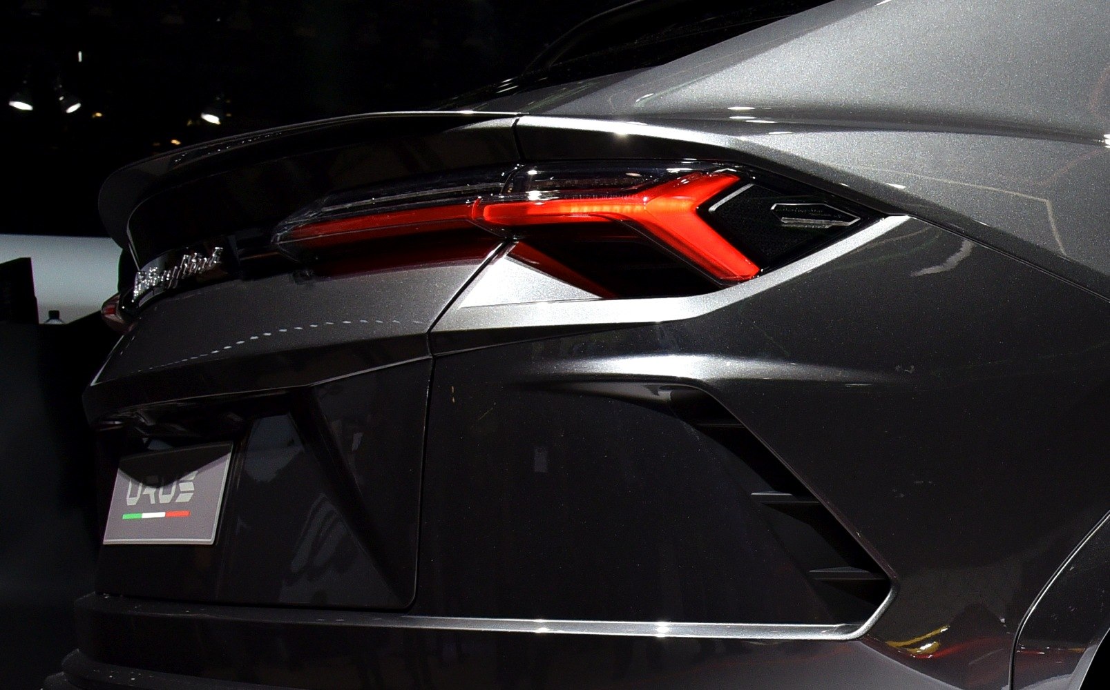 Close-up of sharp taillights and aerodynamic rear design