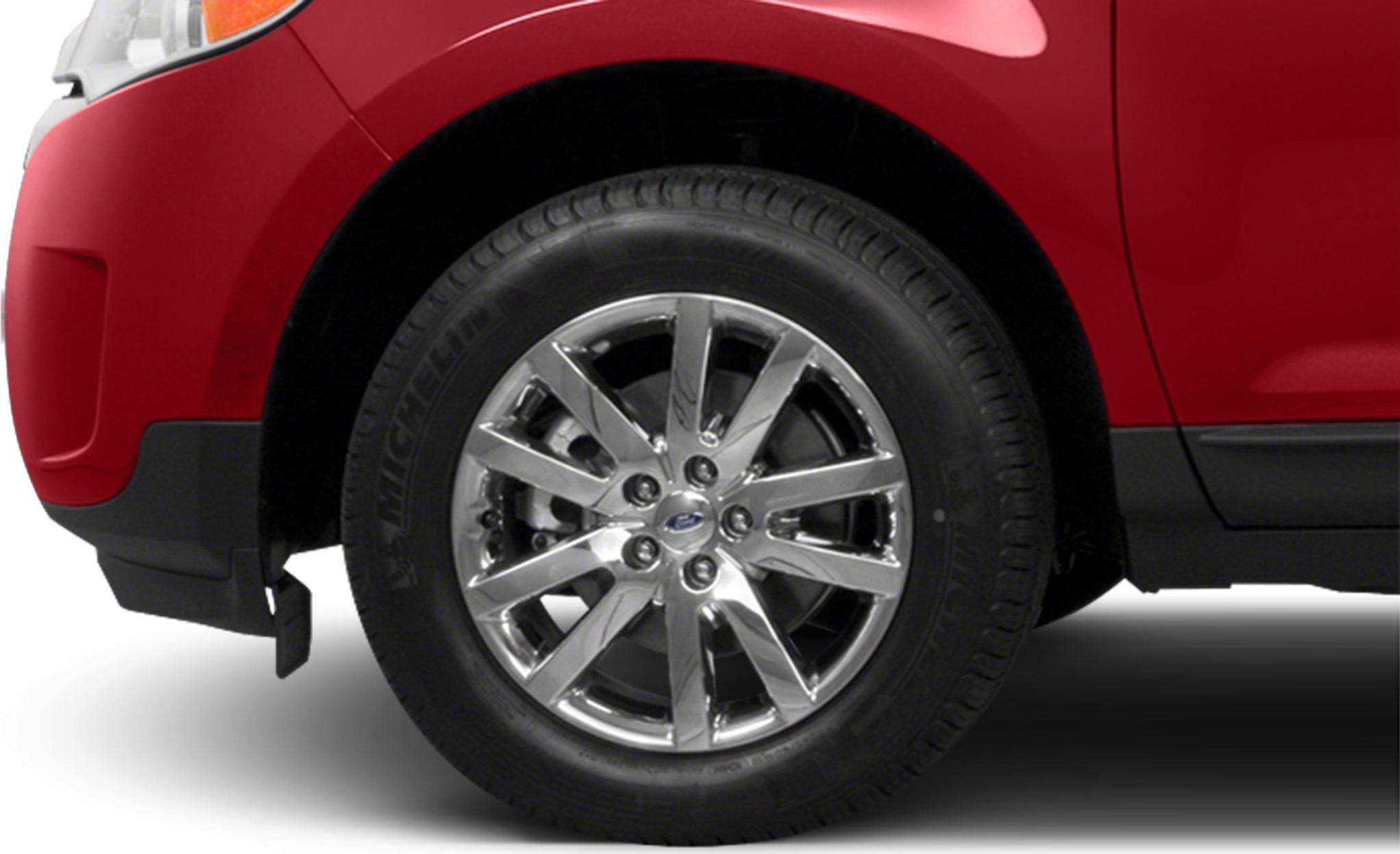 Chrome alloy wheel with Michelin tire on SUV