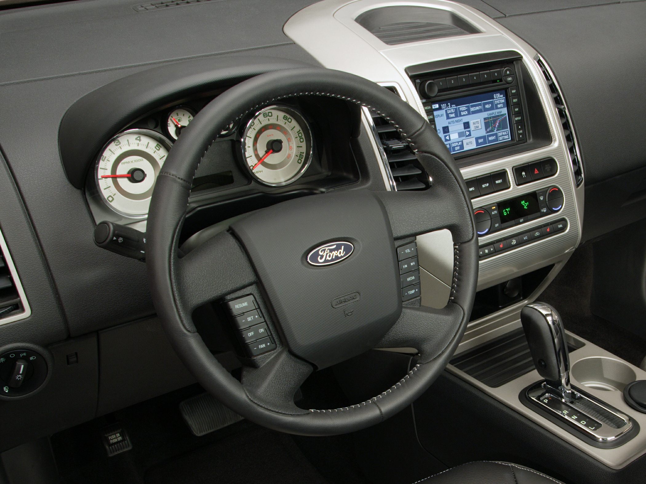 Steering wheel, dashboard, instrument cluster, and gear shifter
