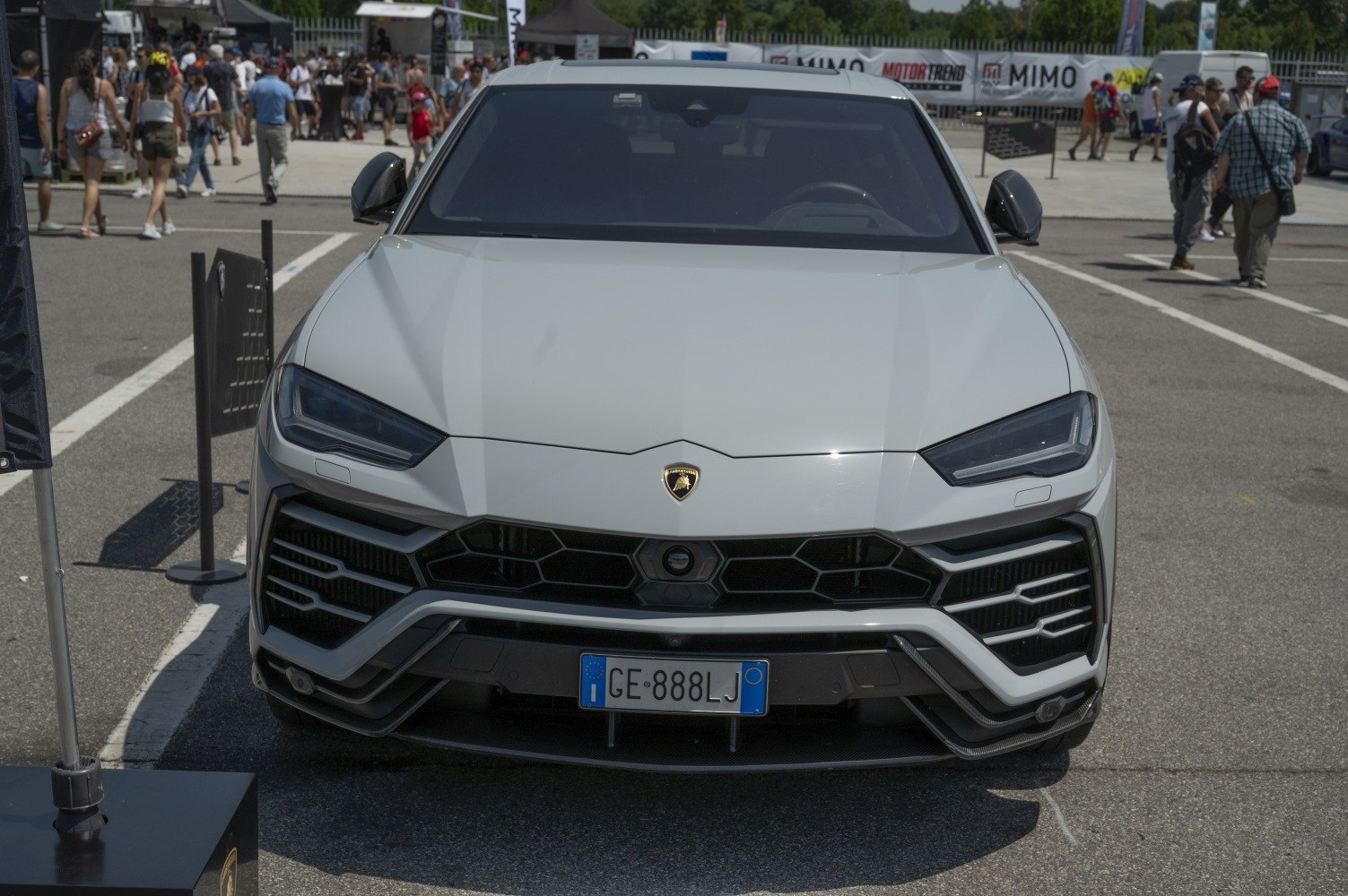 Aggressive front fascia with hexagonal grille and sharp LED headlights.