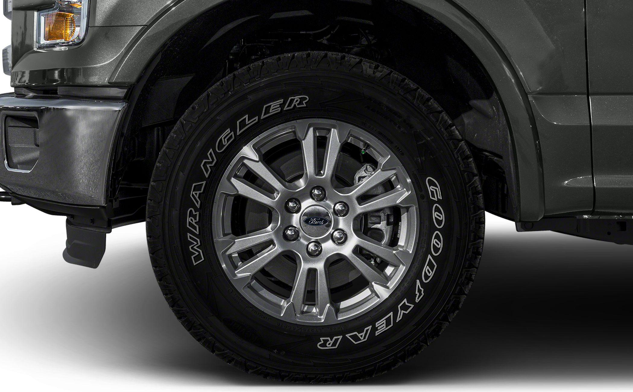 Goodyear Wrangler tire on silver alloy wheel