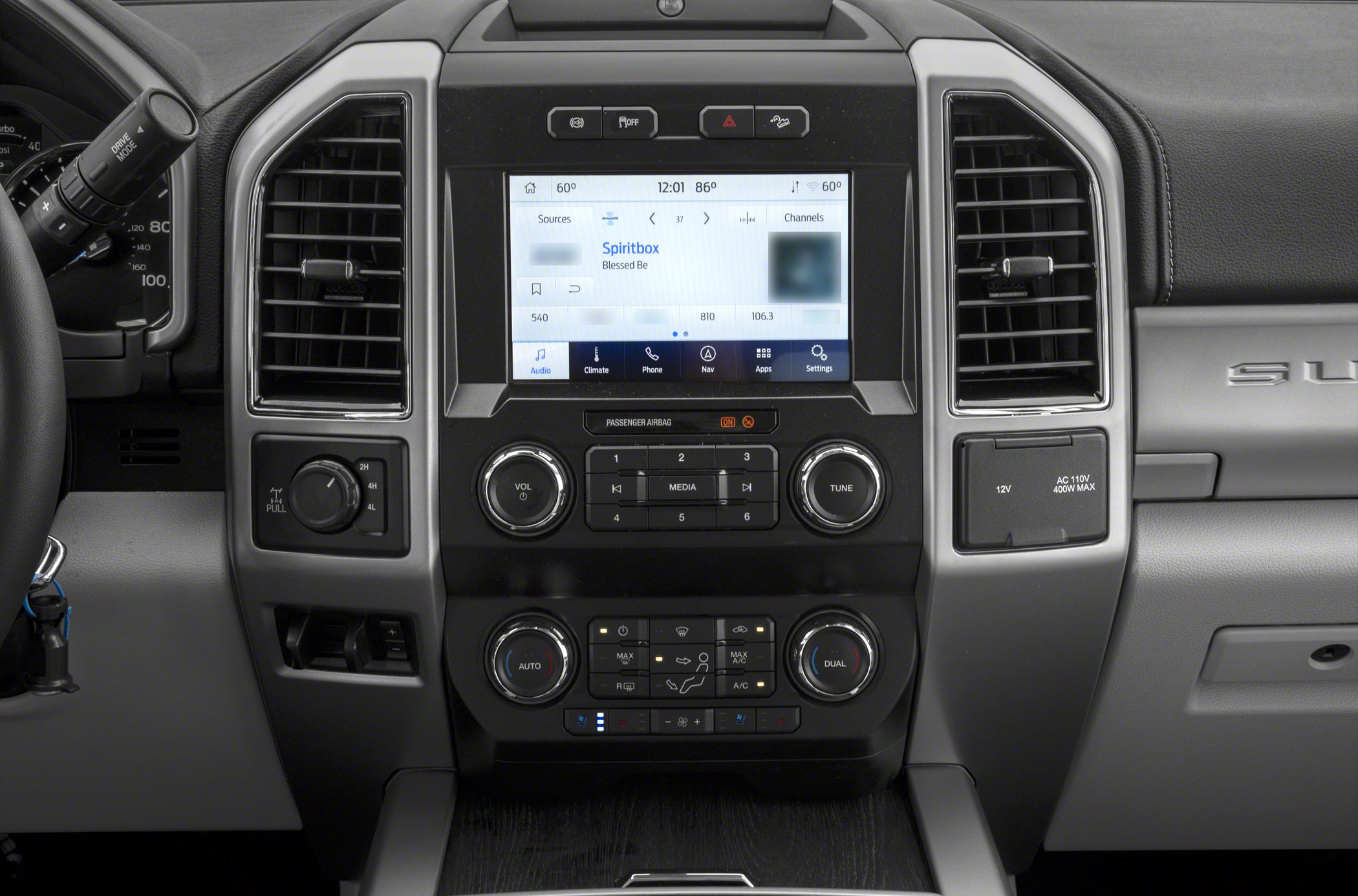 Infotainment touchscreen and advanced climate control in truck dashboard