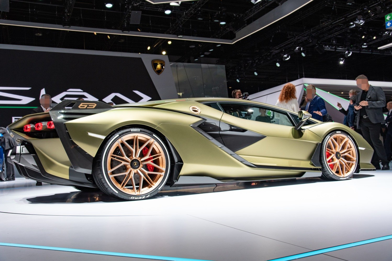 Rear side profile with gold alloy wheels and aerodynamic features