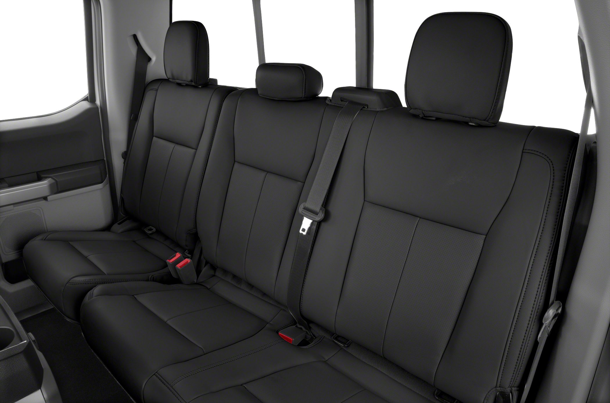 Black leather rear bench seating with headrests and seat belts.