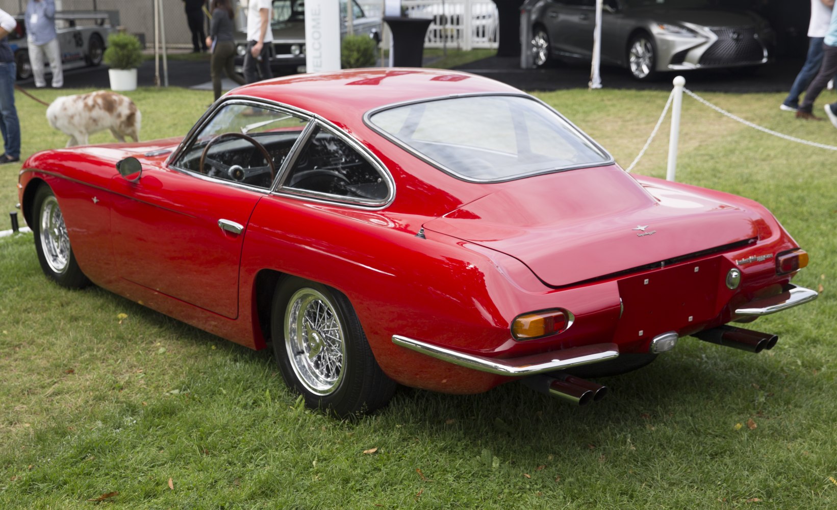 Classic rear design and wire-spoke wheels of a vintage grand tourer