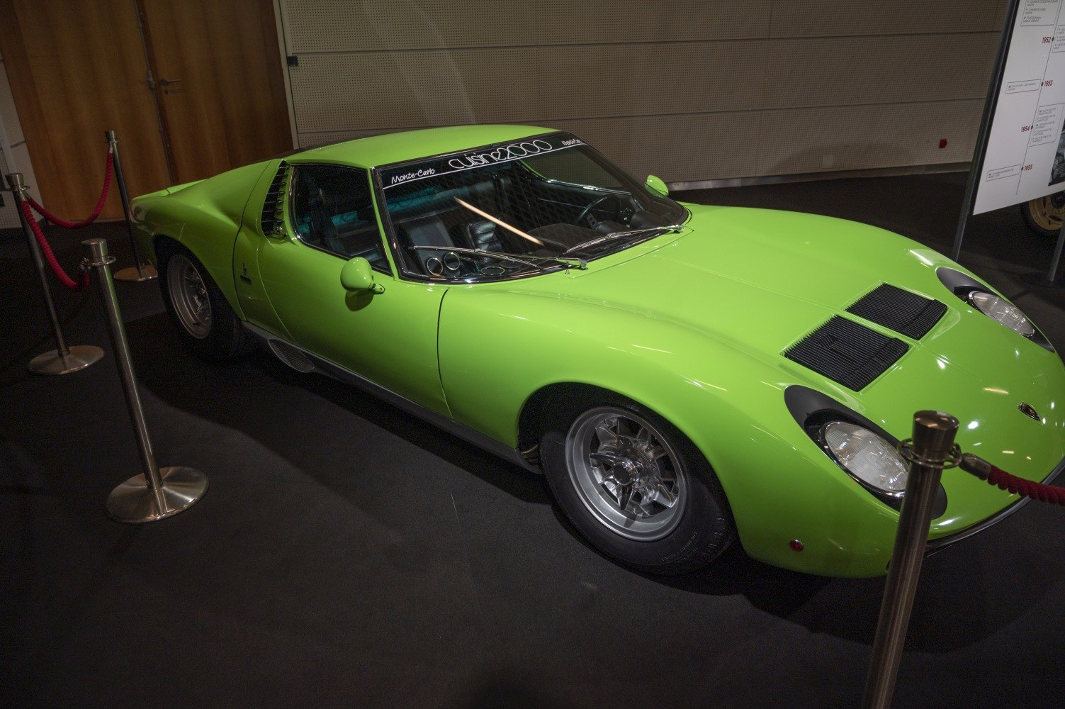 Low-slung sports coupe with covered headlights and aerodynamic design