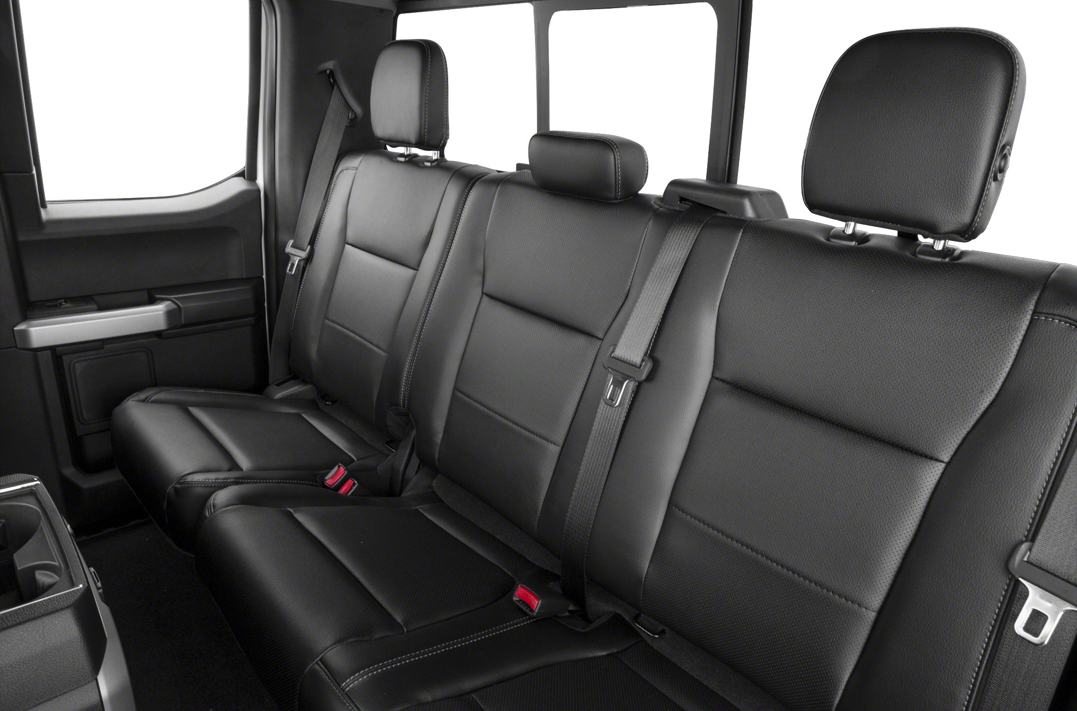 Black leather rear seats with headrests and seat belts.