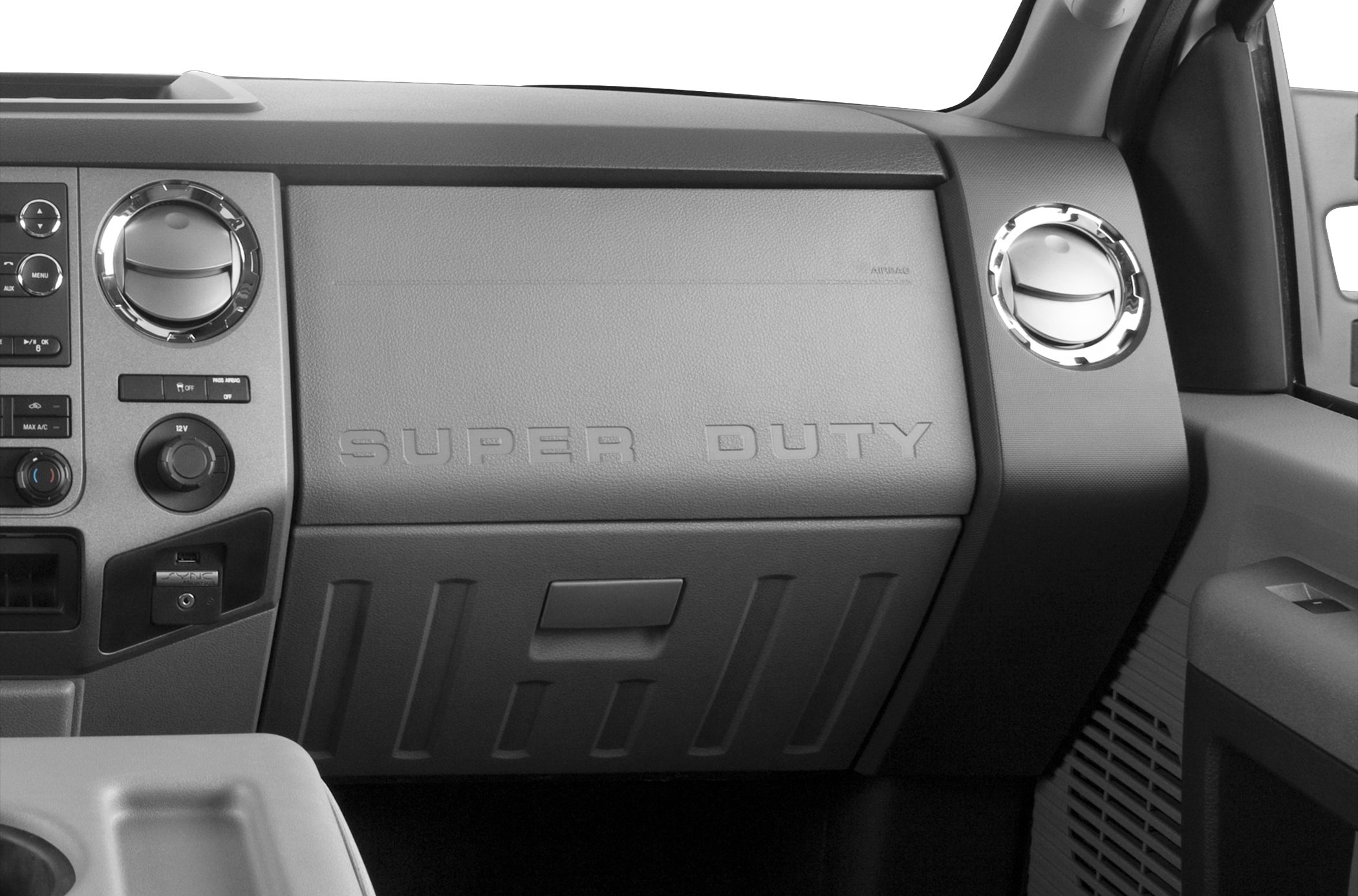 Ford Super Duty vehicle dashboard with control panel and glove compartment