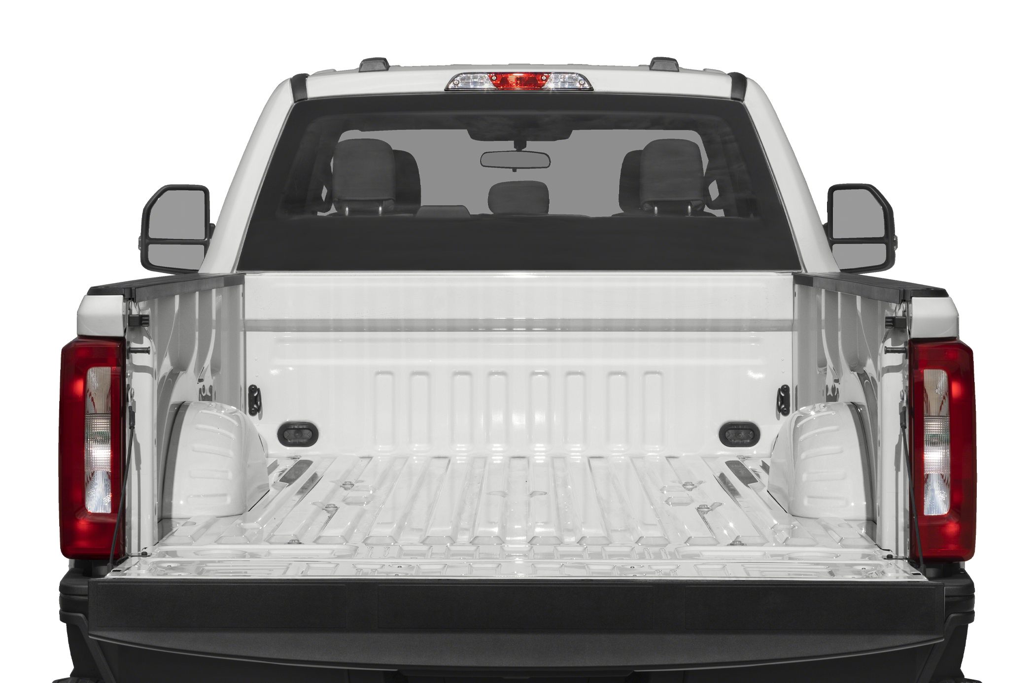 Open cargo bed and tailgate from rear view of pickup truck