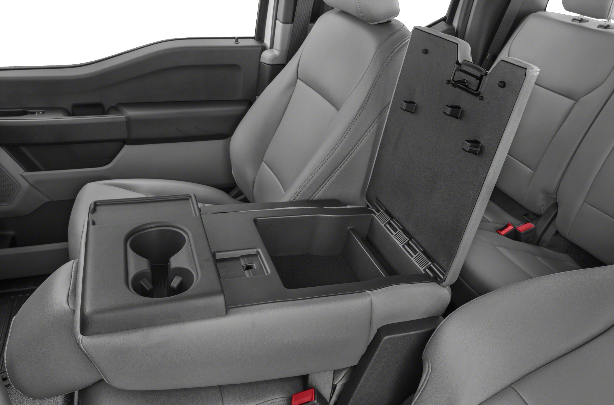 Center console with cupholders and storage compartment in vehicle interior