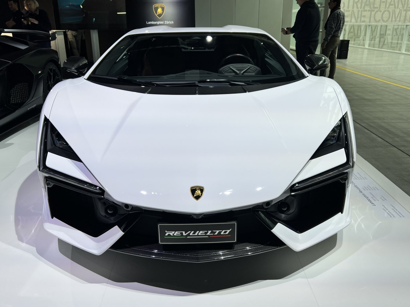 Sharp headlights and aerodynamic vents on a sleek front fascia