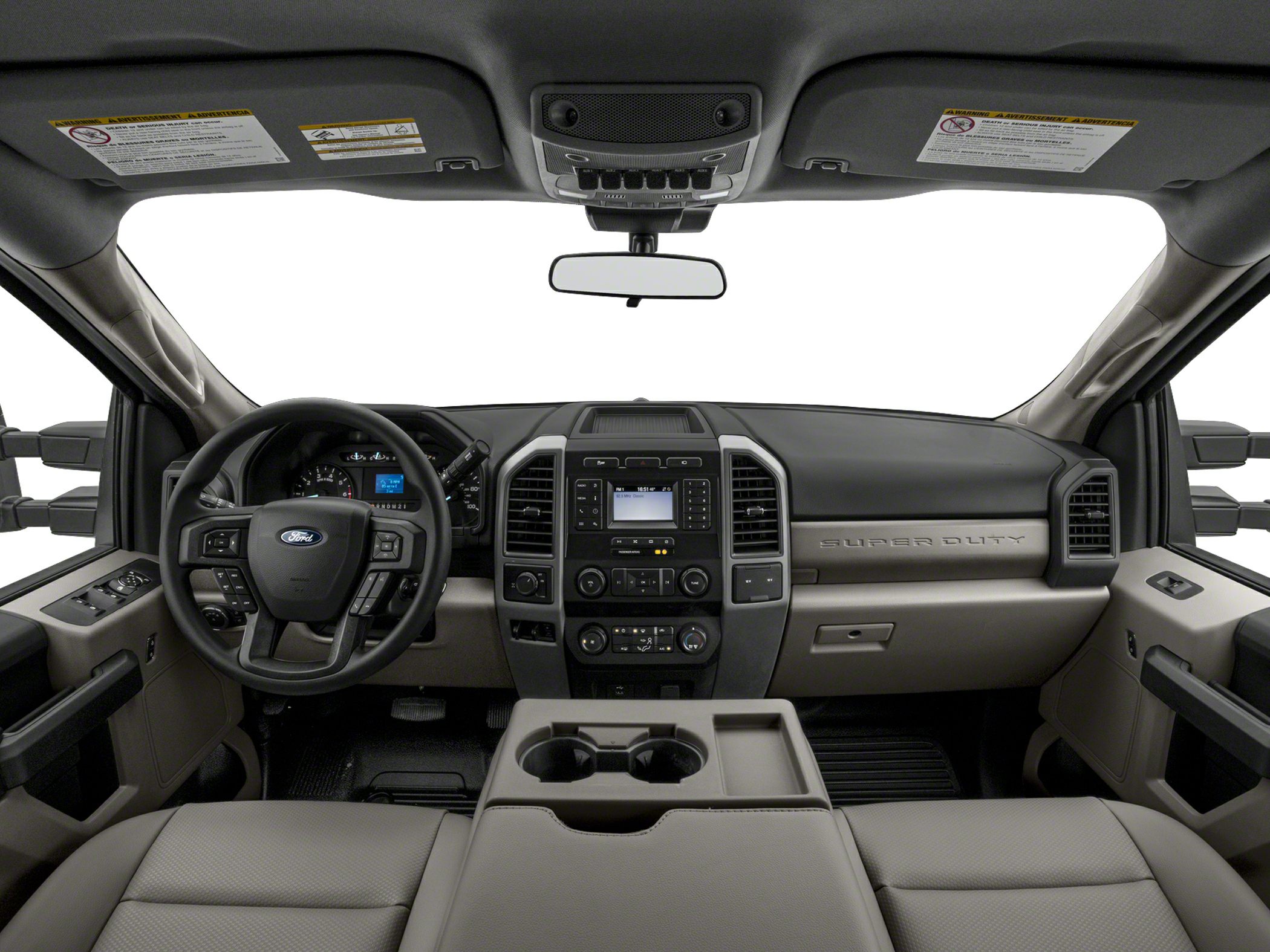 Truck interior with dashboard, steering wheel, center console, and front seats