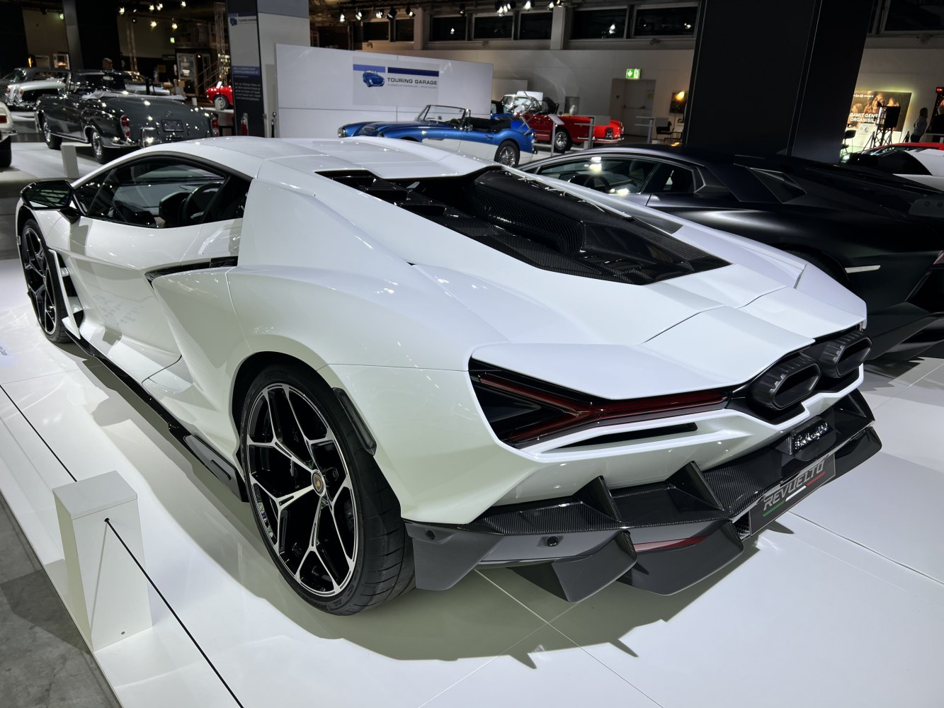 Aerodynamic rear design with sharp taillights and advanced diffuser.