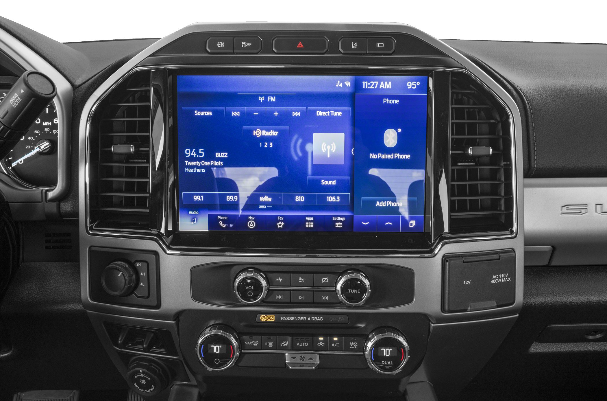 Infotainment touchscreen and dual-zone climate control panel with media and temperature settings