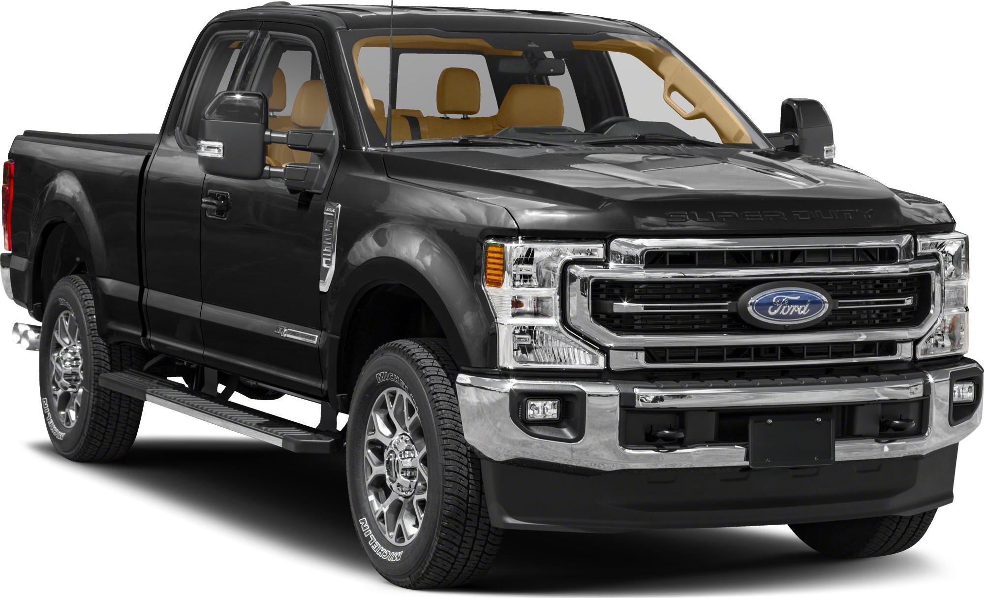 Front perspective of heavy-duty pickup with chrome grille and long cargo bed