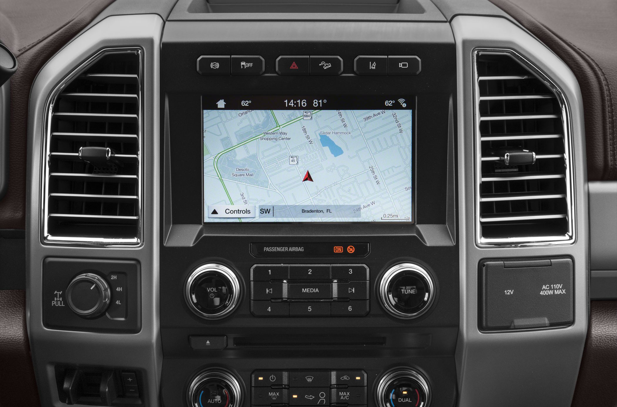 Infotainment system with navigation and control panel featuring 4x4 drive selector and climate controls