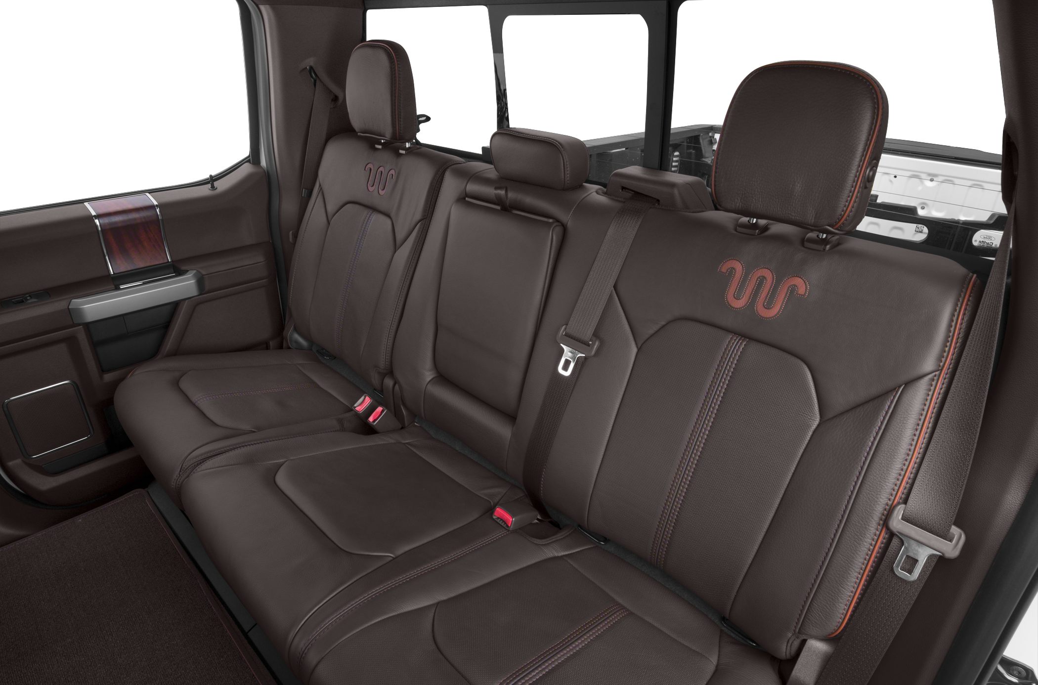 Rear leather seats with custom stitching and headrests