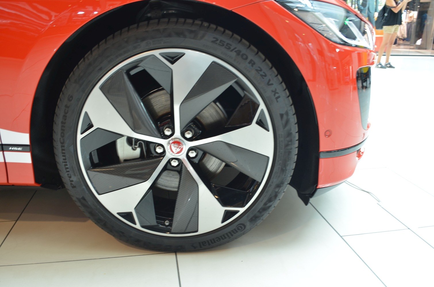 Close-up of a 22-inch alloy wheel with Continental tire on an SUV.